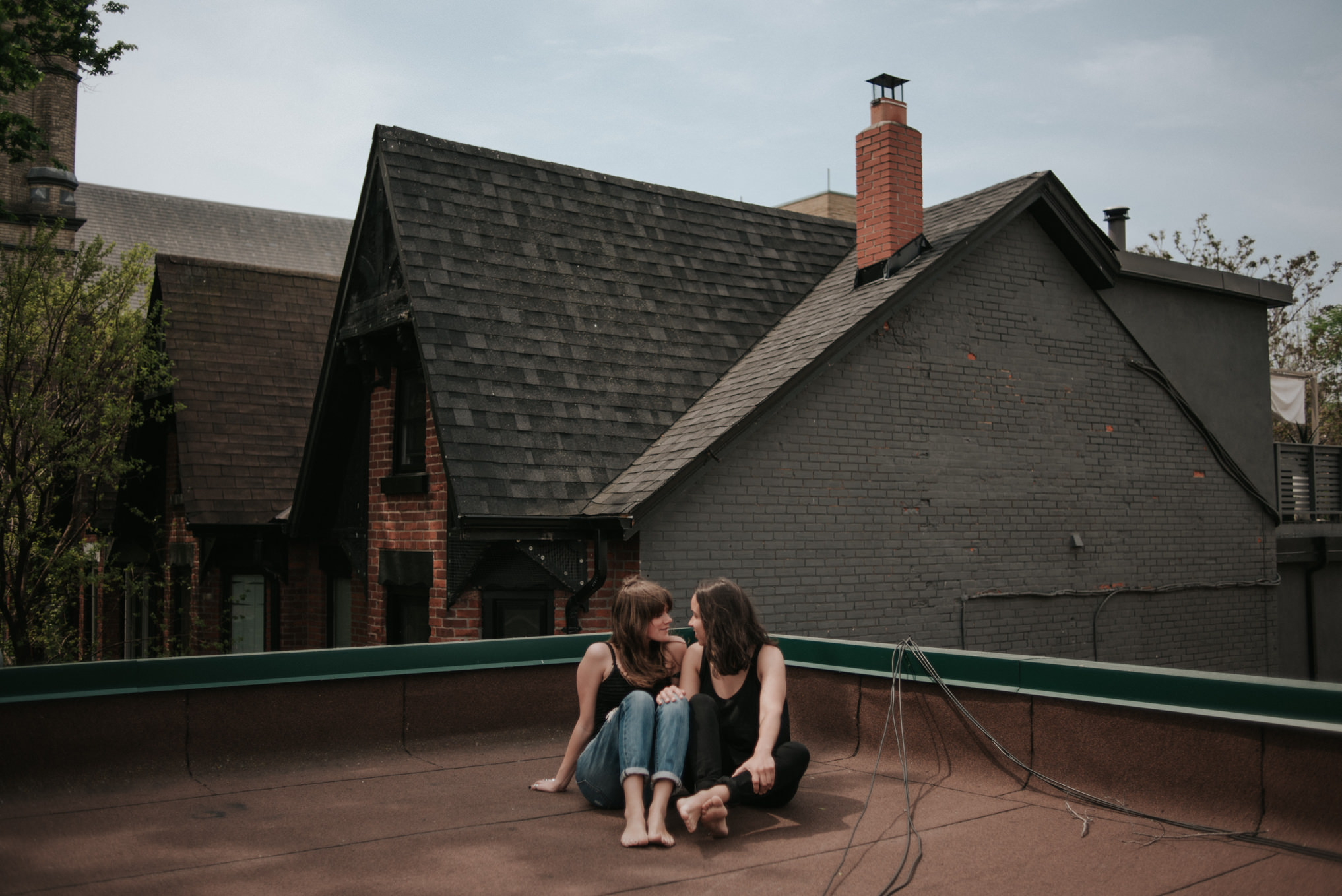 An intimate rooftop femme engagement shoot by Daring Wanderer // www.daringwanderer.com