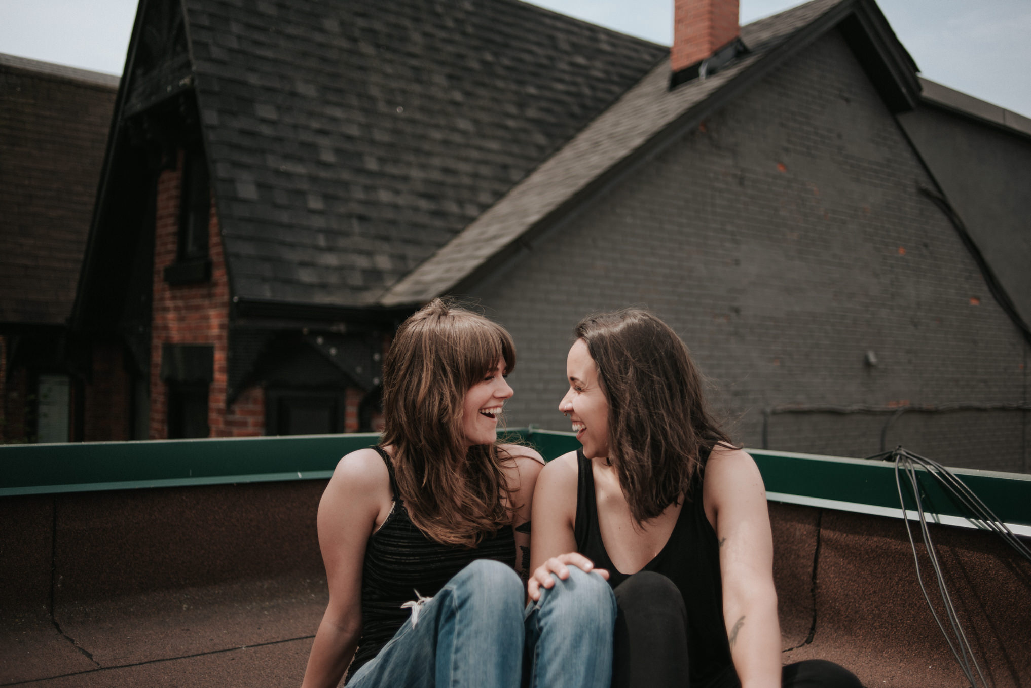 An intimate rooftop femme engagement shoot by Daring Wanderer // www.daringwanderer.com