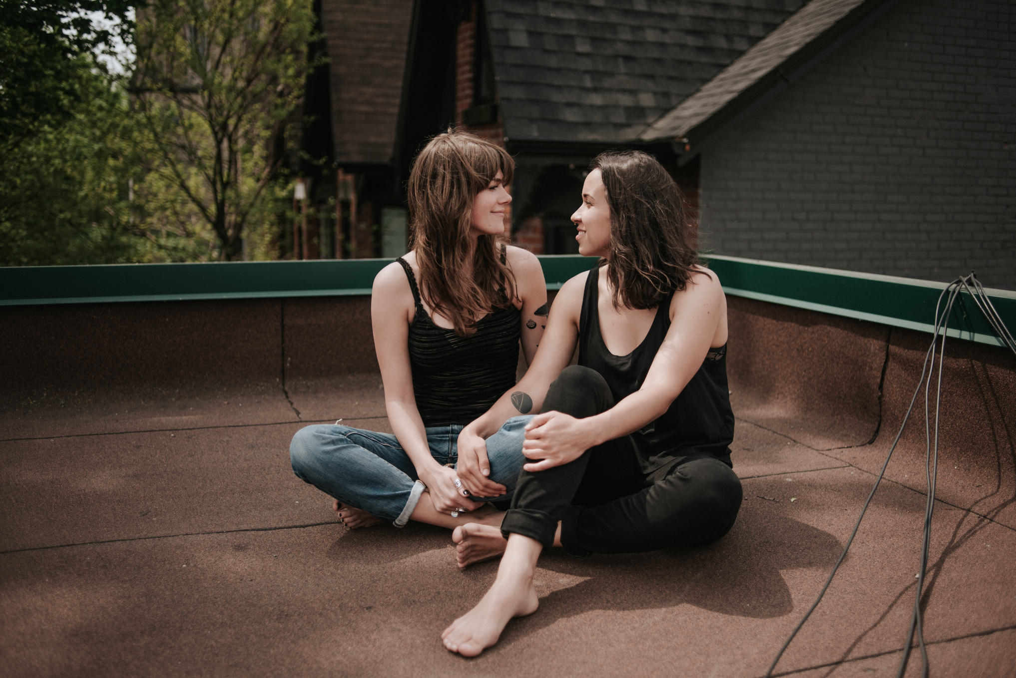 An intimate rooftop femme engagement shoot by Daring Wanderer // www.daringwanderer.com