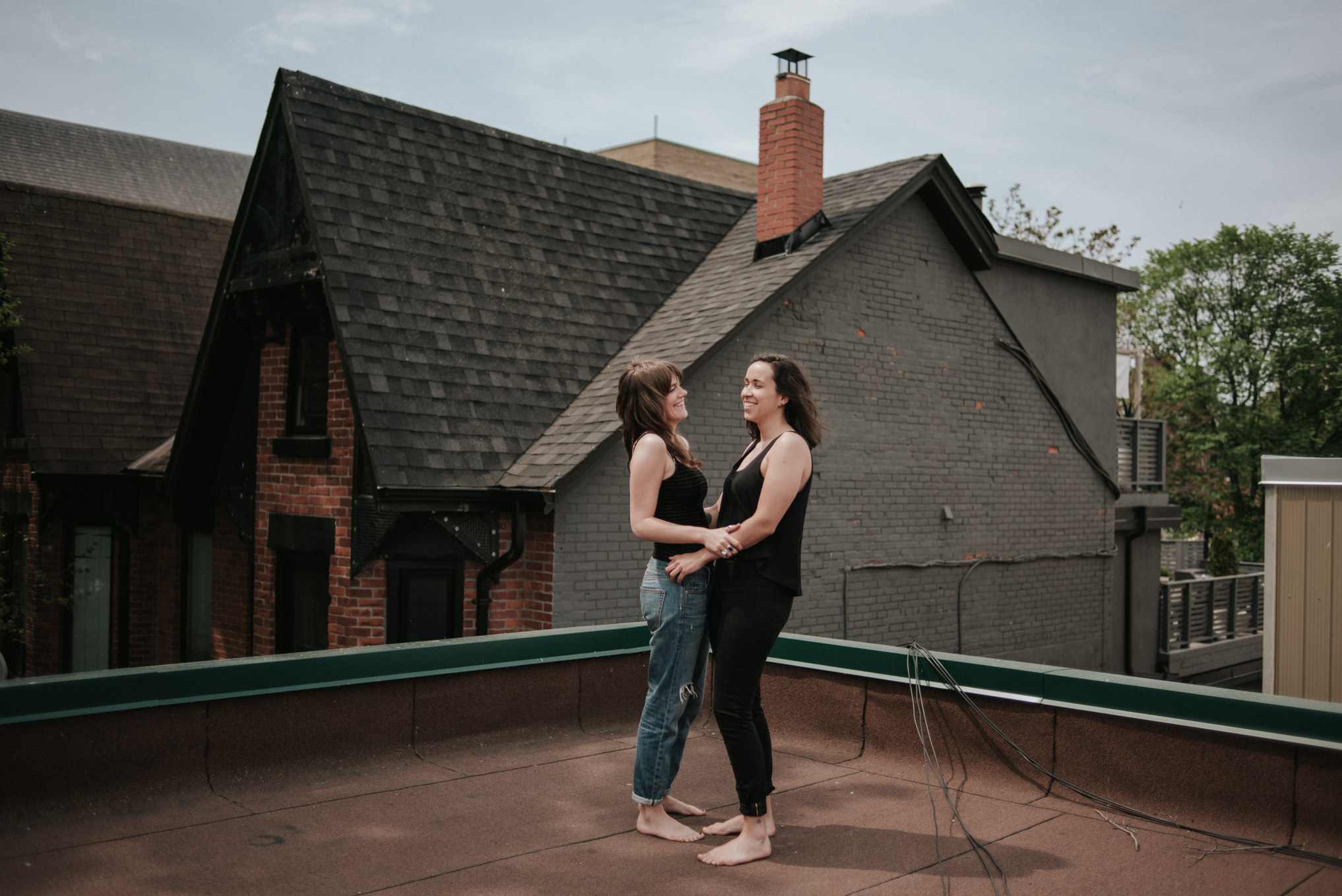 An intimate rooftop femme engagement shoot by Daring Wanderer // www.daringwanderer.com