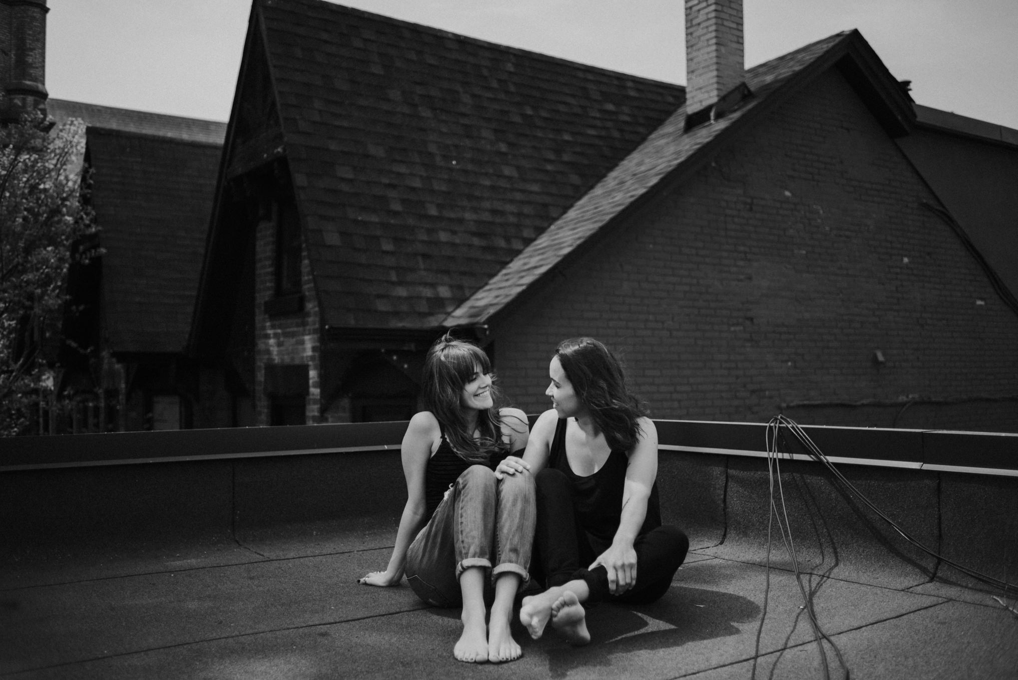 An intimate rooftop femme engagement shoot by Daring Wanderer // www.daringwanderer.com