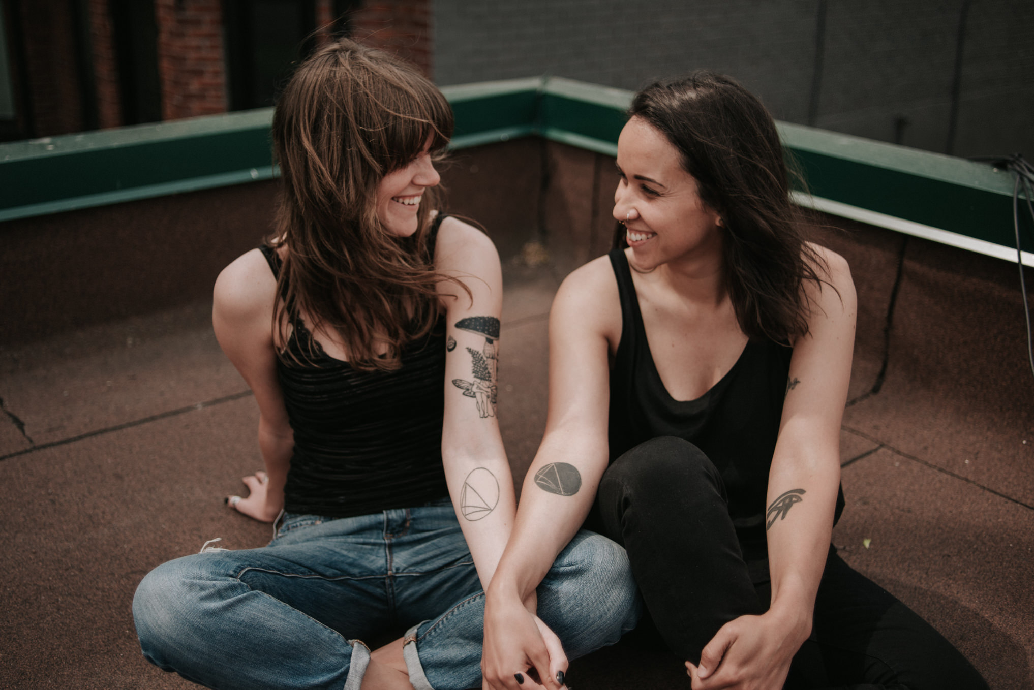 An intimate rooftop femme engagement shoot by Daring Wanderer // www.daringwanderer.com