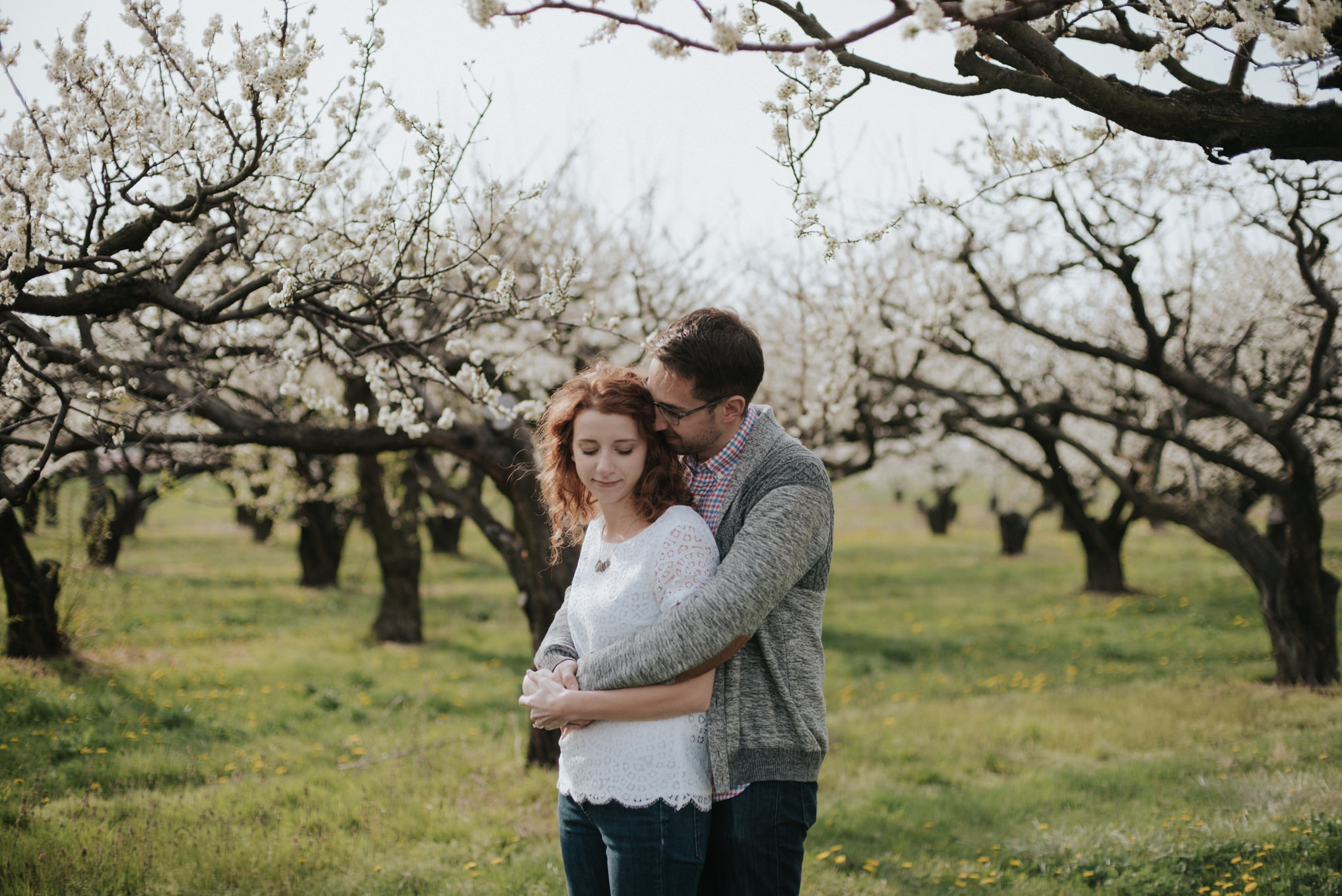 Spring bloom orchard engagement shoot by Daring Wanderer // www.daringwanderer.com