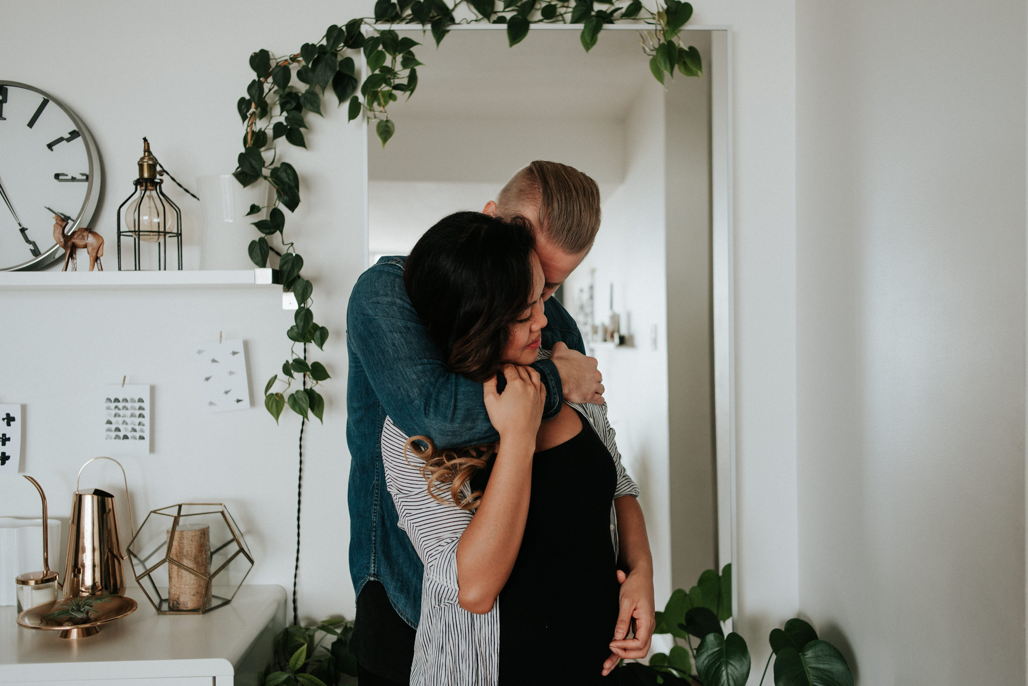 A cozy in home maternity shoot with a gorgeous couple in their beautifully styled Toronto condo // Photographed by Toronto Wedding Photographer Daring Wanderer