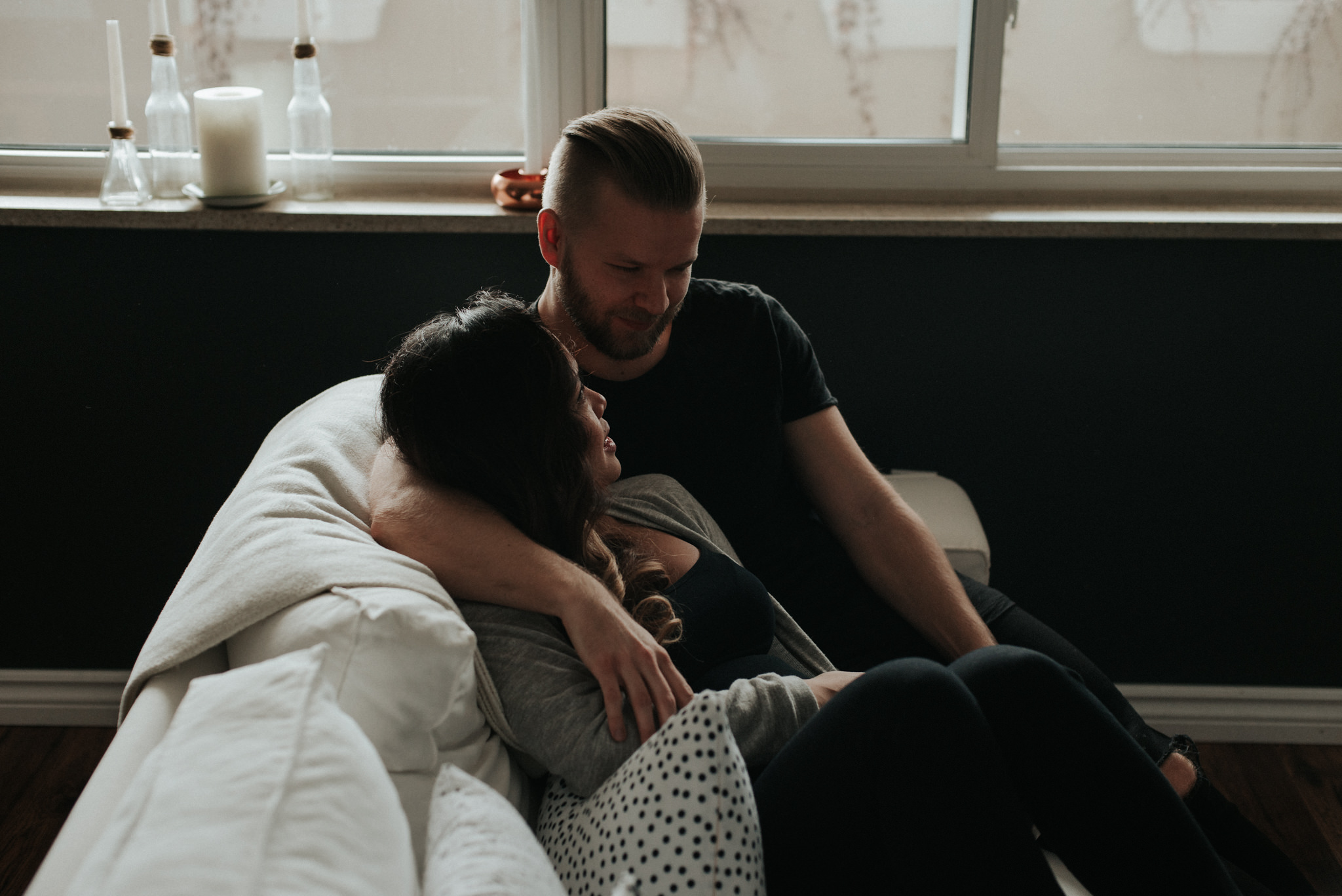 A cozy in home maternity shoot with a gorgeous couple in their beautifully styled Toronto condo // Photographed by Toronto Wedding Photographer Daring Wanderer