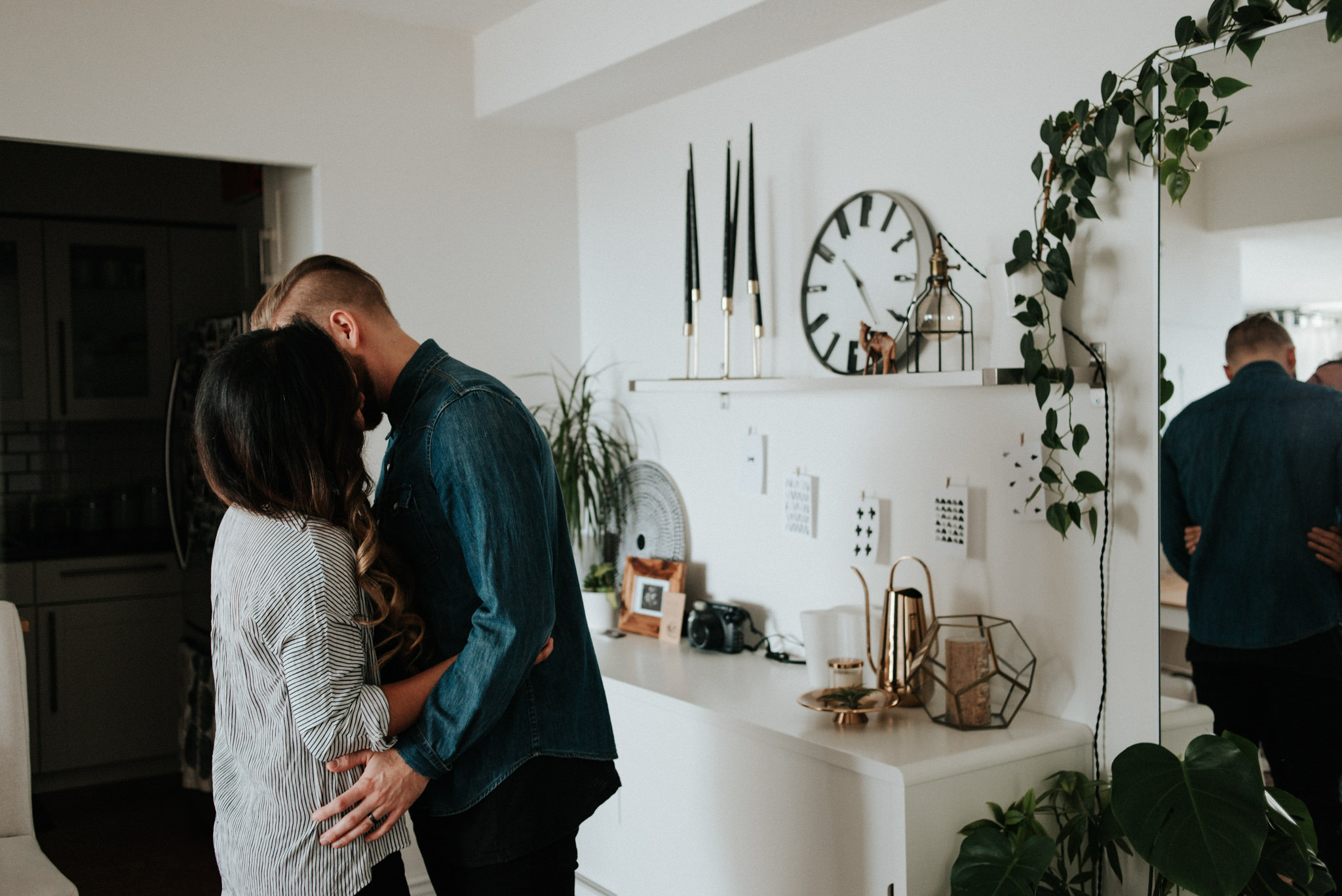 A cozy in home maternity shoot with a gorgeous couple in their beautifully styled Toronto condo // Photographed by Toronto Wedding Photographer Daring Wanderer