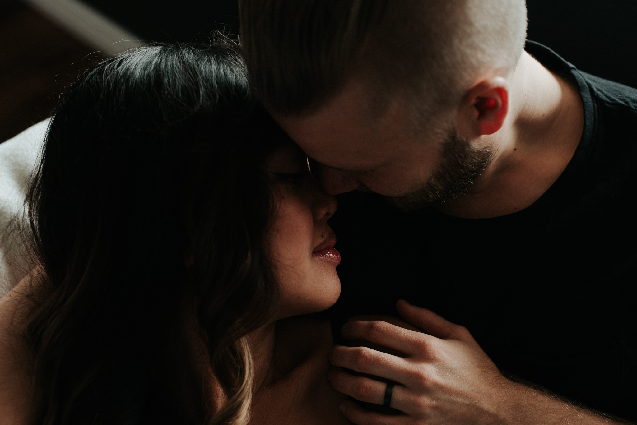 A cozy in home maternity shoot with a gorgeous couple in their beautifully styled Toronto condo // Photographed by Toronto Wedding Photographer Daring Wanderer