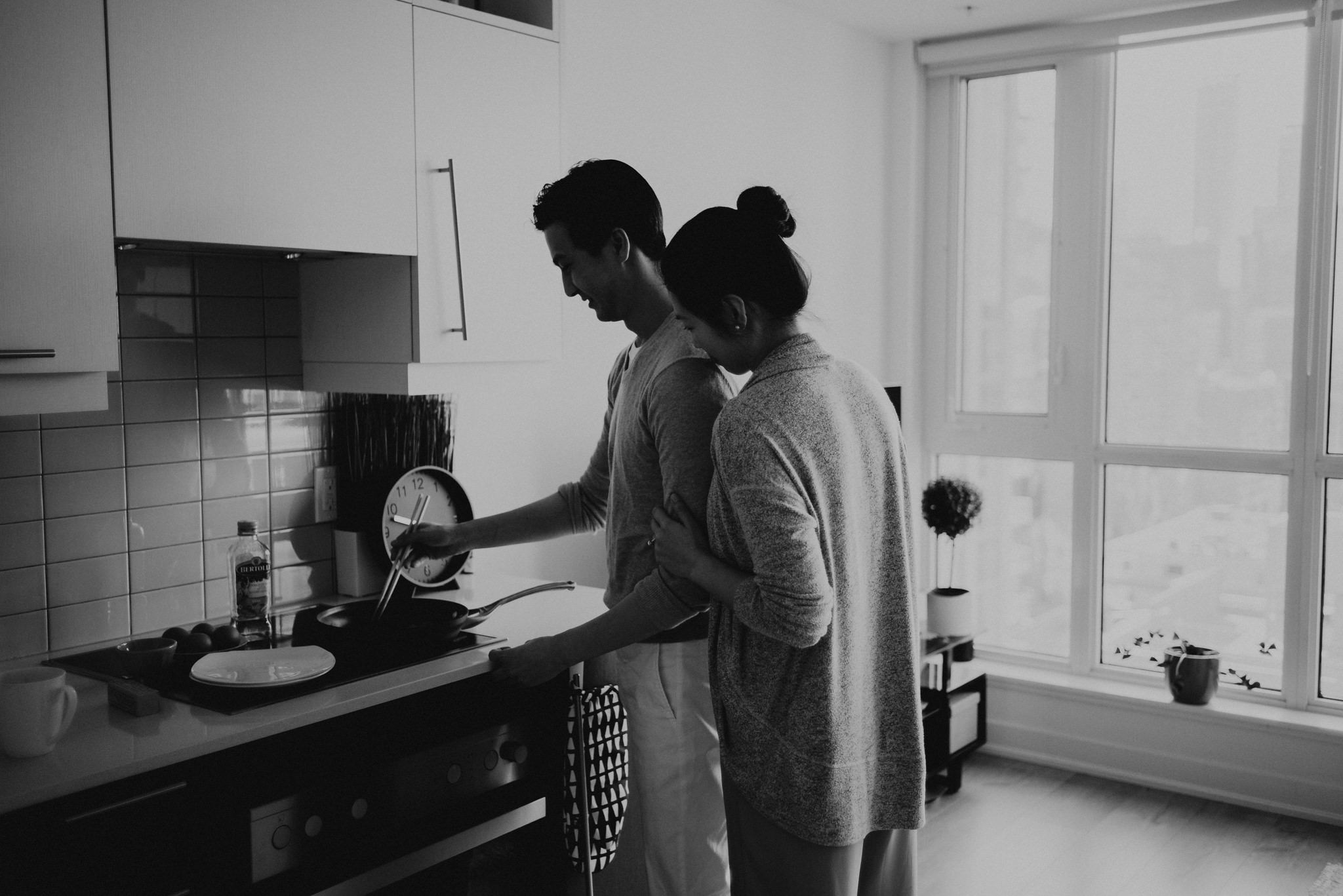 A cozy intimate morning sunrise engagement in their bright condo in downtown Toronto // Photographed by Toronto Wedding Photographer Daring Wanderer