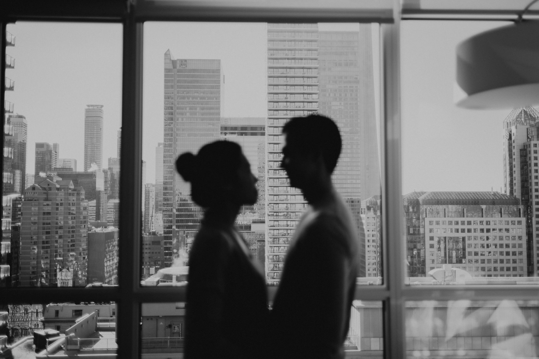 A cozy intimate morning sunrise engagement in their bright condo in downtown Toronto // Photographed by Toronto Wedding Photographer Daring Wanderer