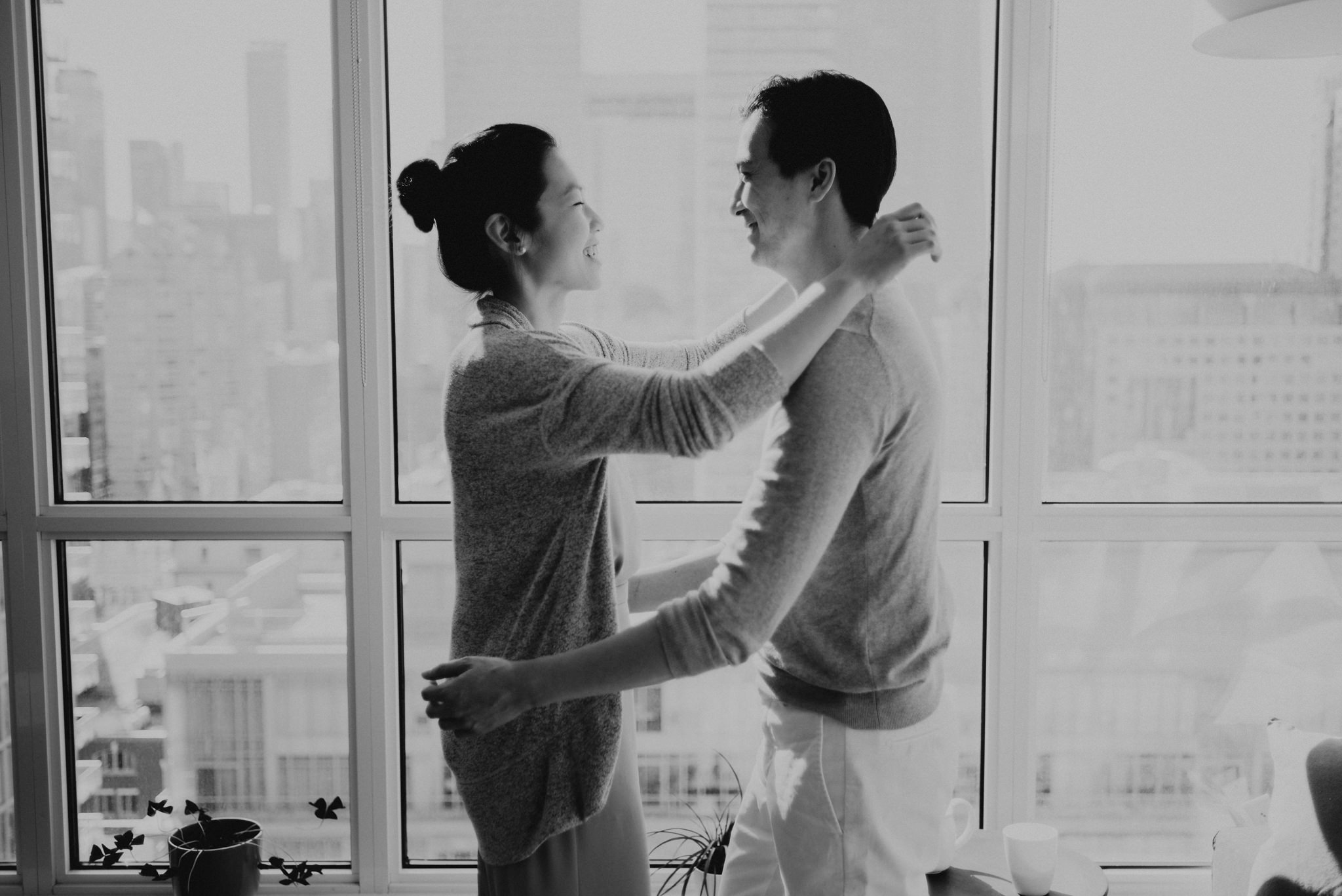 A cozy intimate morning sunrise engagement in their bright condo in downtown Toronto // Photographed by Toronto Wedding Photographer Daring Wanderer