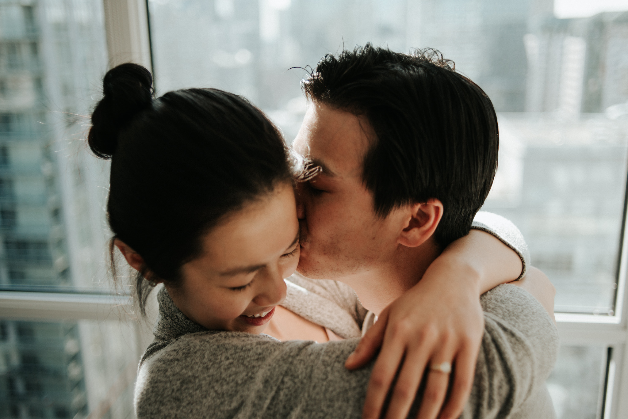 A cozy intimate morning sunrise engagement in their bright condo in downtown Toronto // Photographed by Toronto Wedding Photographer Daring Wanderer
