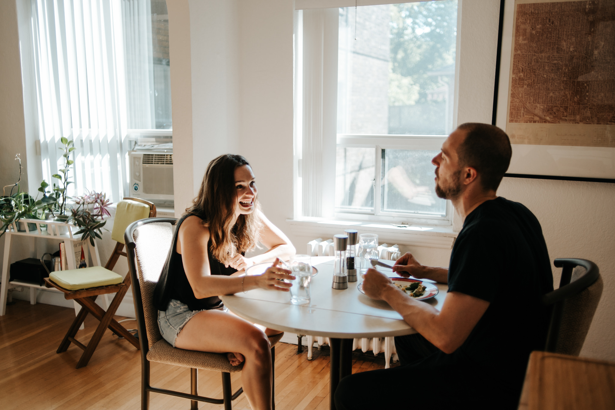 Couple eating breakfast in apartment