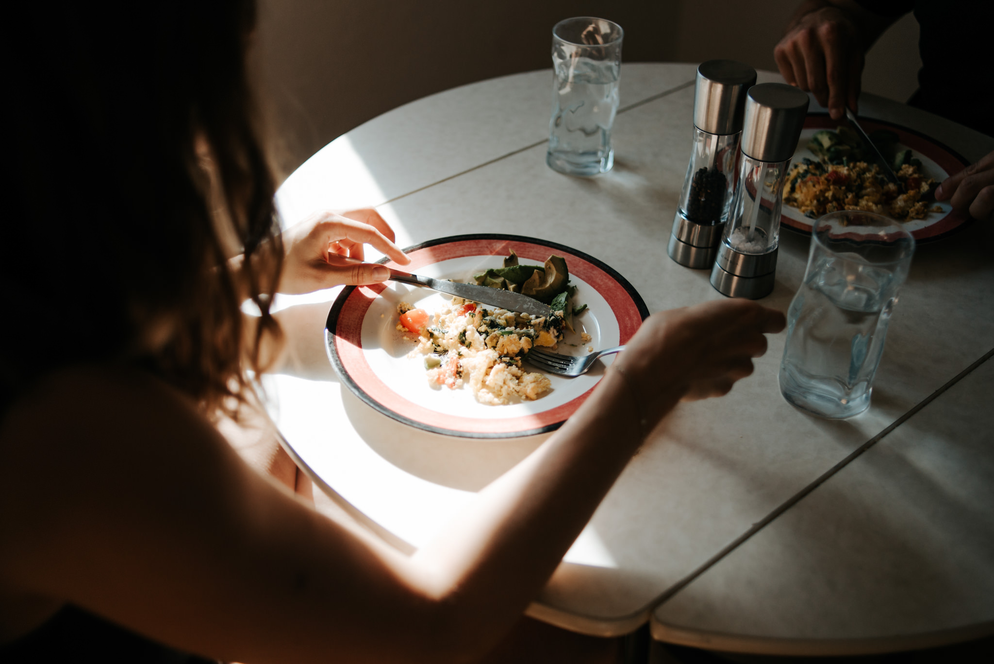 Omelet breakfast on plate in sunlight