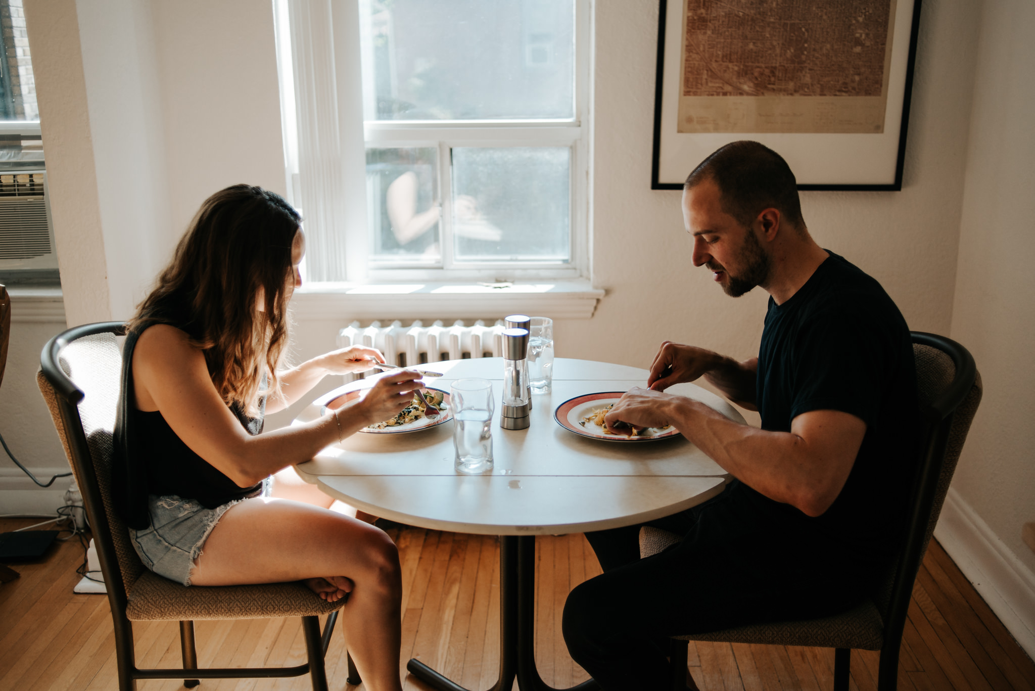 Couple eating breakfast in apartment