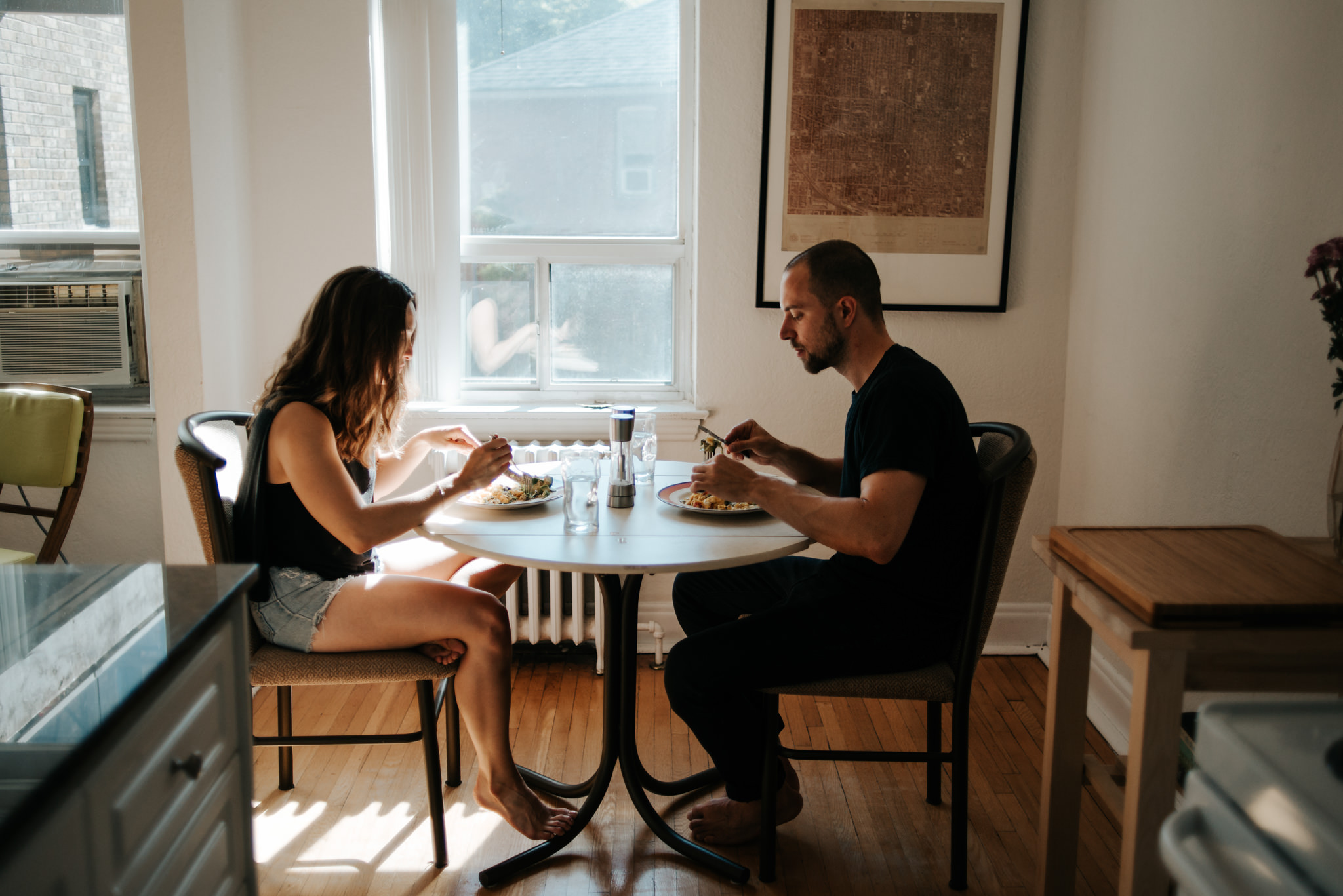 Couple eating breakfast in apartment