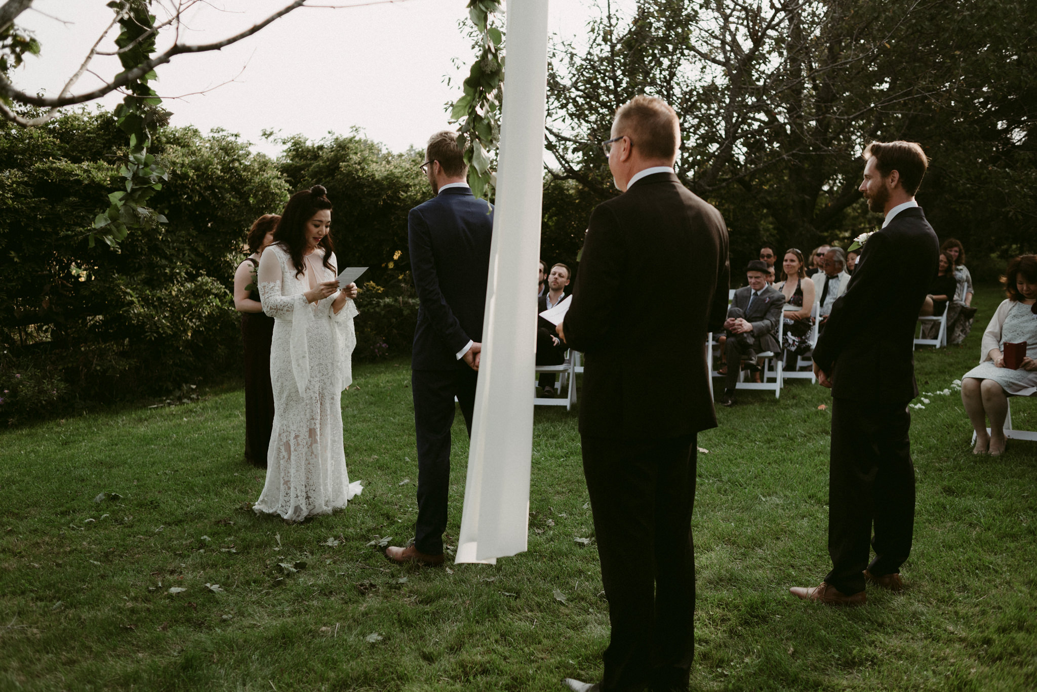 bride reading vows to groom