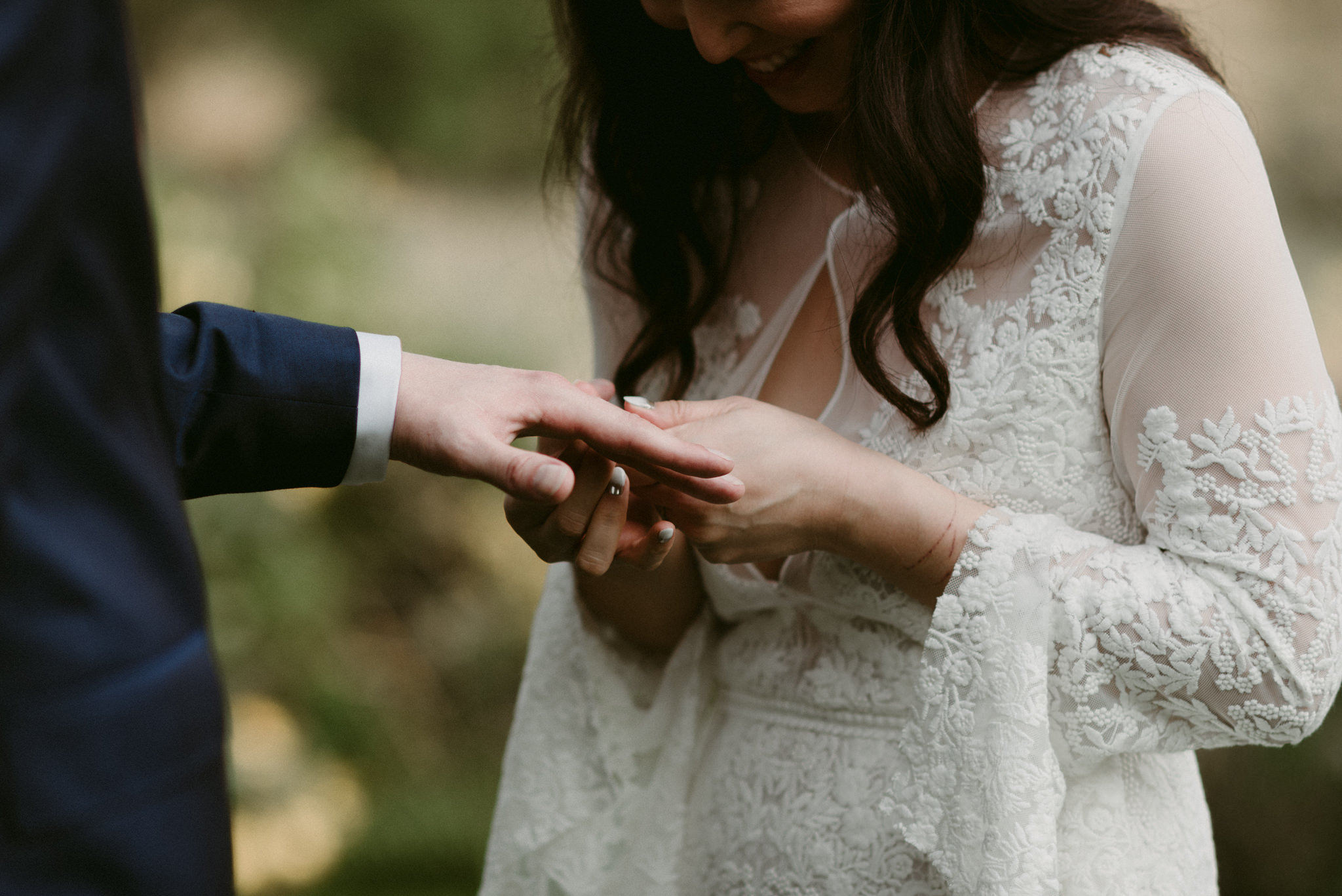 Exchanging rings at wedding ceremony