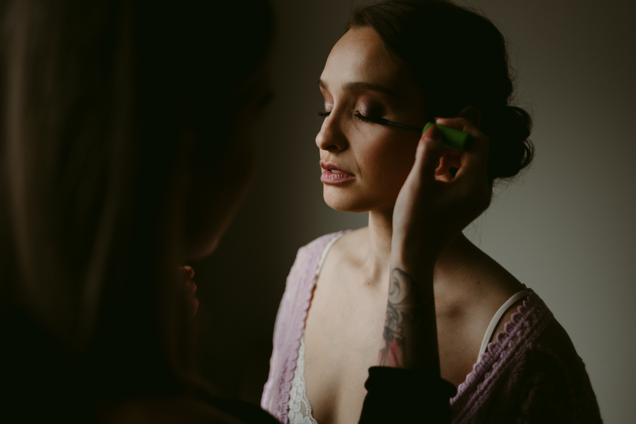 Bride getting makeup done