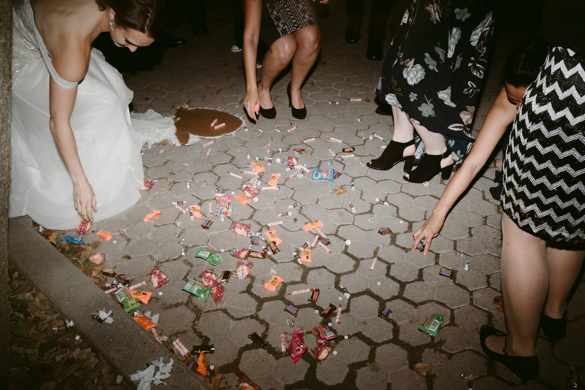 Candy from piñata on ground at wedding reception