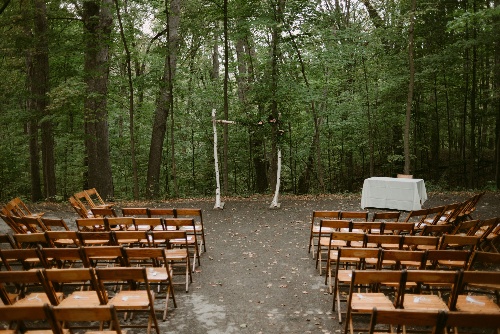 Forest wedding ceremony setup at Kortright Centre for Conservation Wedding