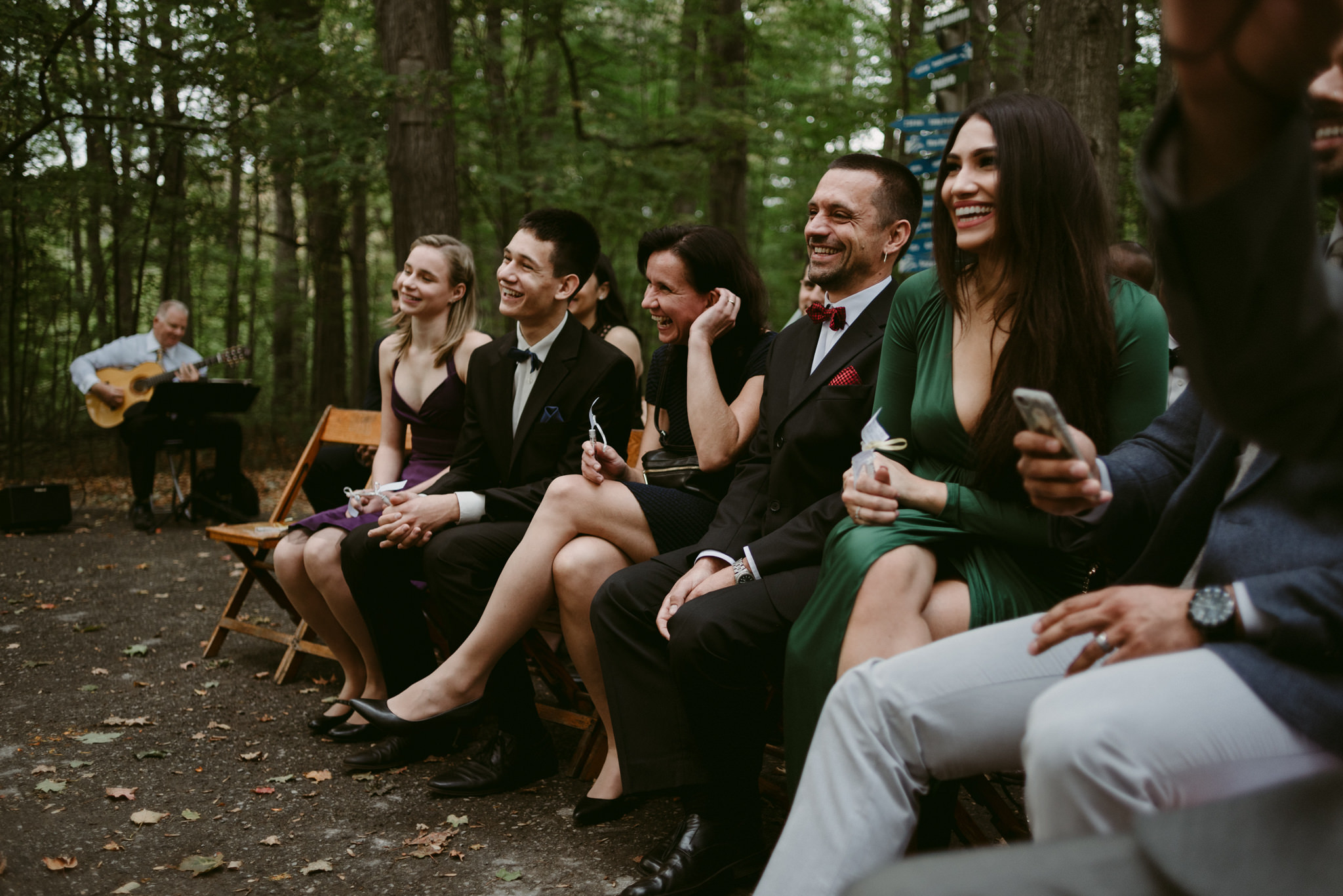 Guests laughing during ceremony