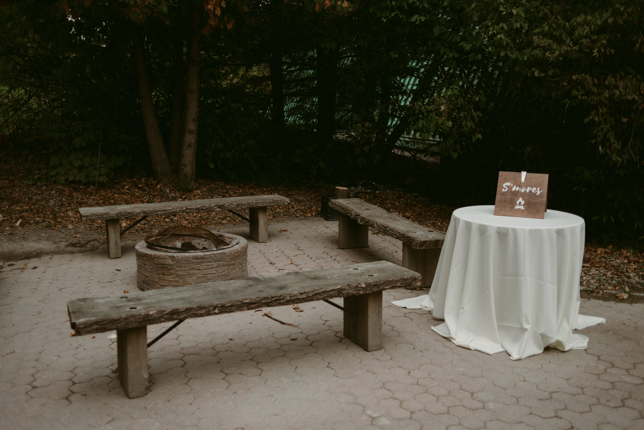 greenery vines on wooden table for sweetheart table at wedding reception