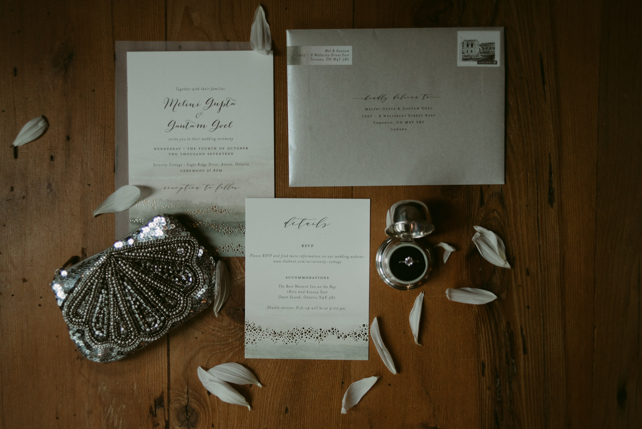 Wedding invitation layout with flowers and sequin purse