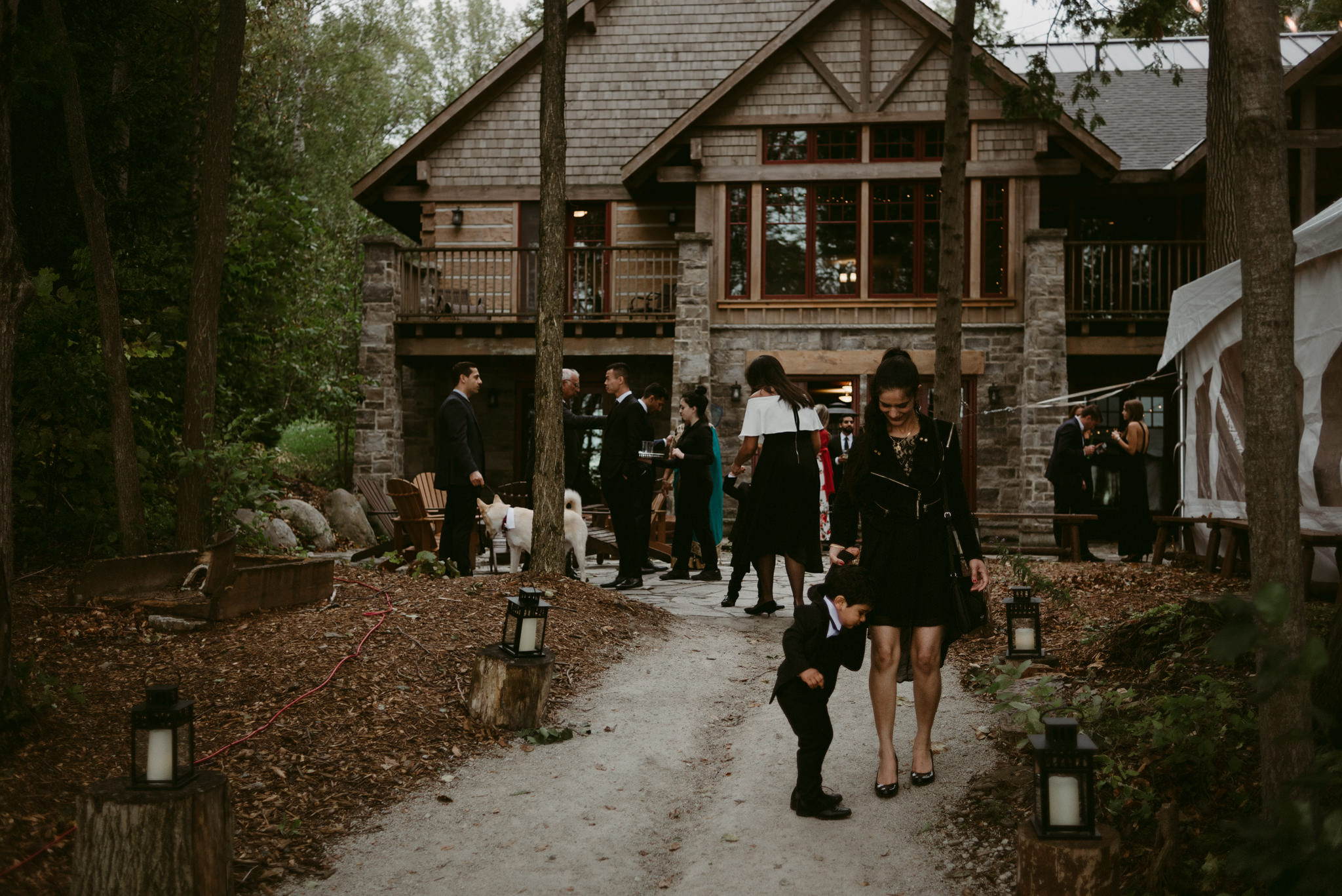 guests outside at cottage wedding