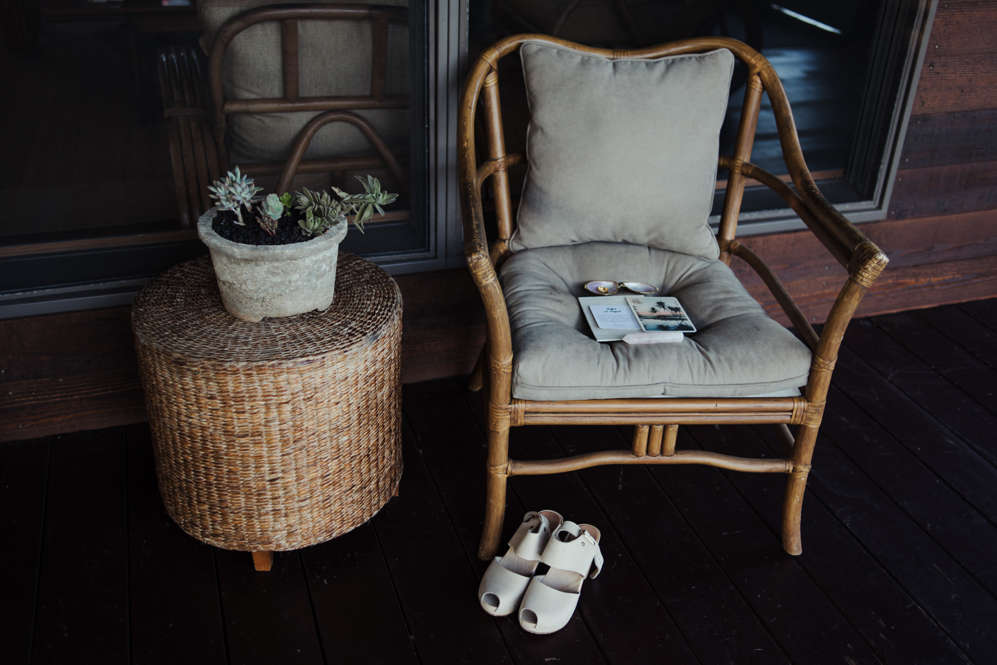 Wedding shoes and invitation on chair