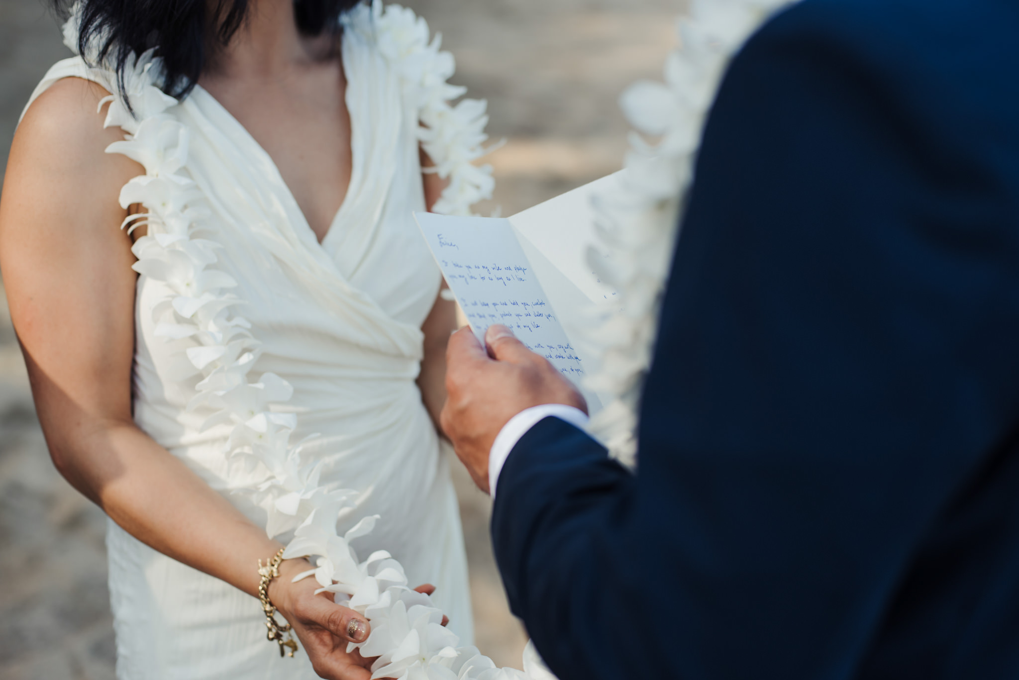 groom reading vows to bride