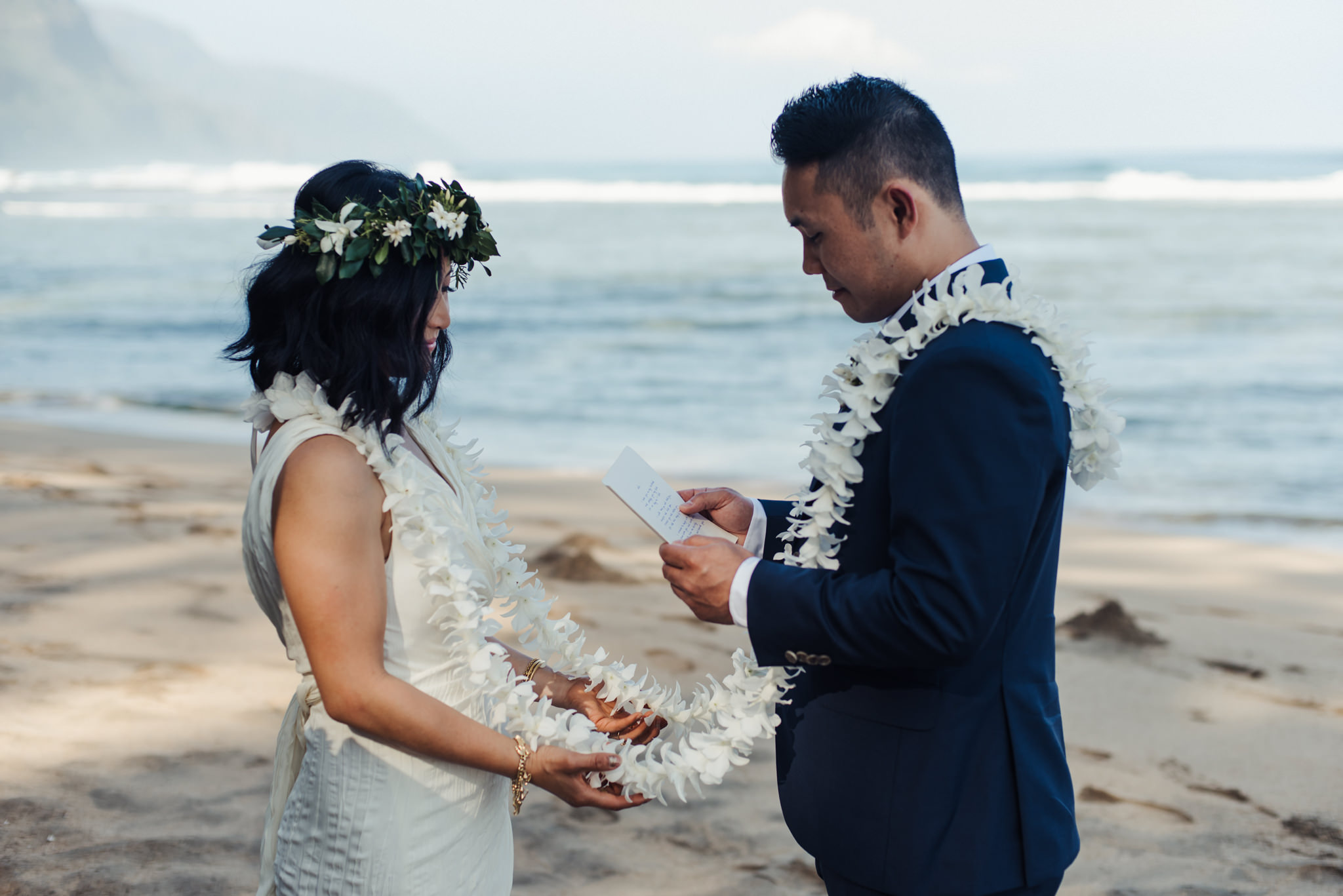 groom reading vows to bride