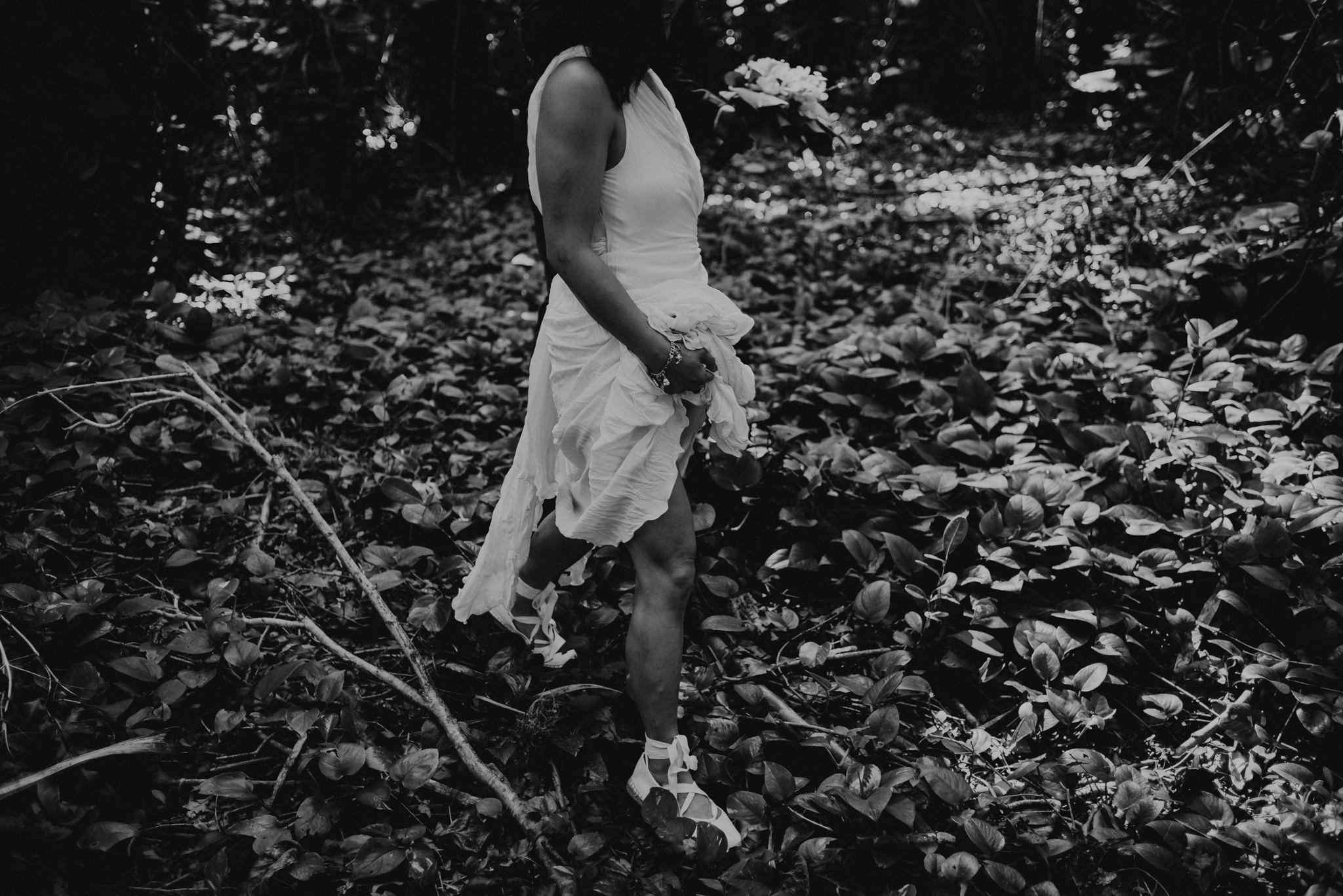 bride walking in forest