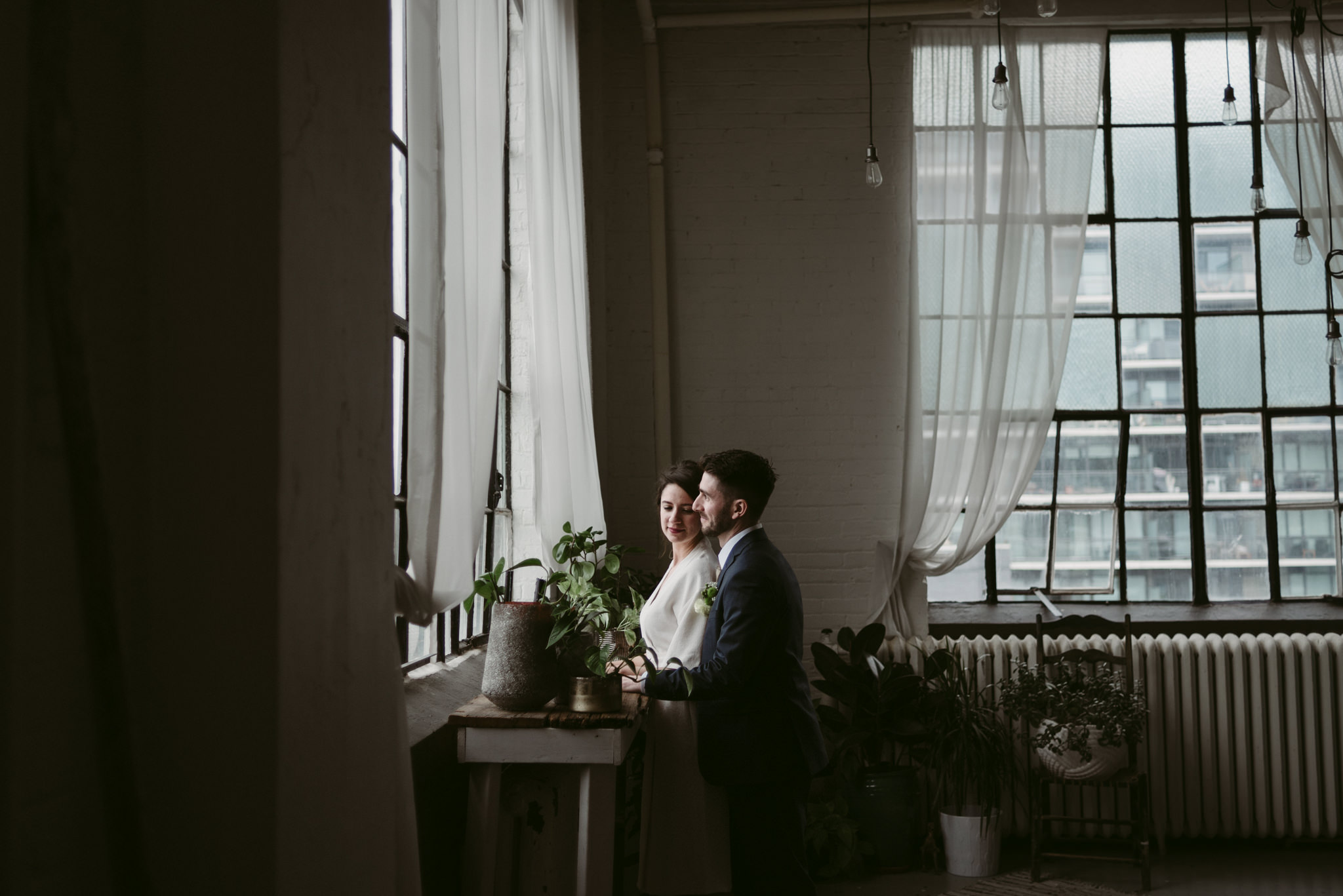 Bride and groom in trendy Toronto loft