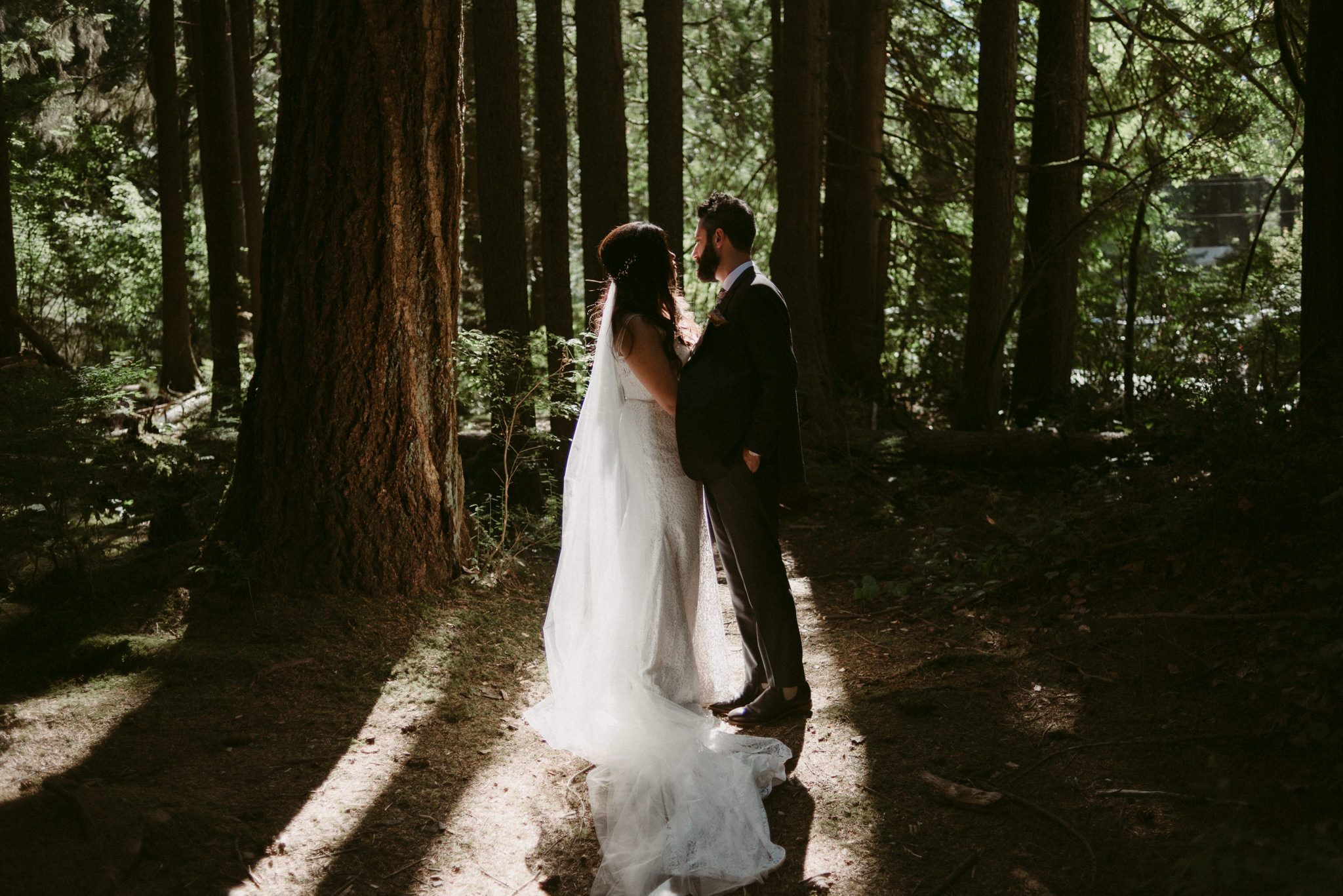 bride and groom first look in fores