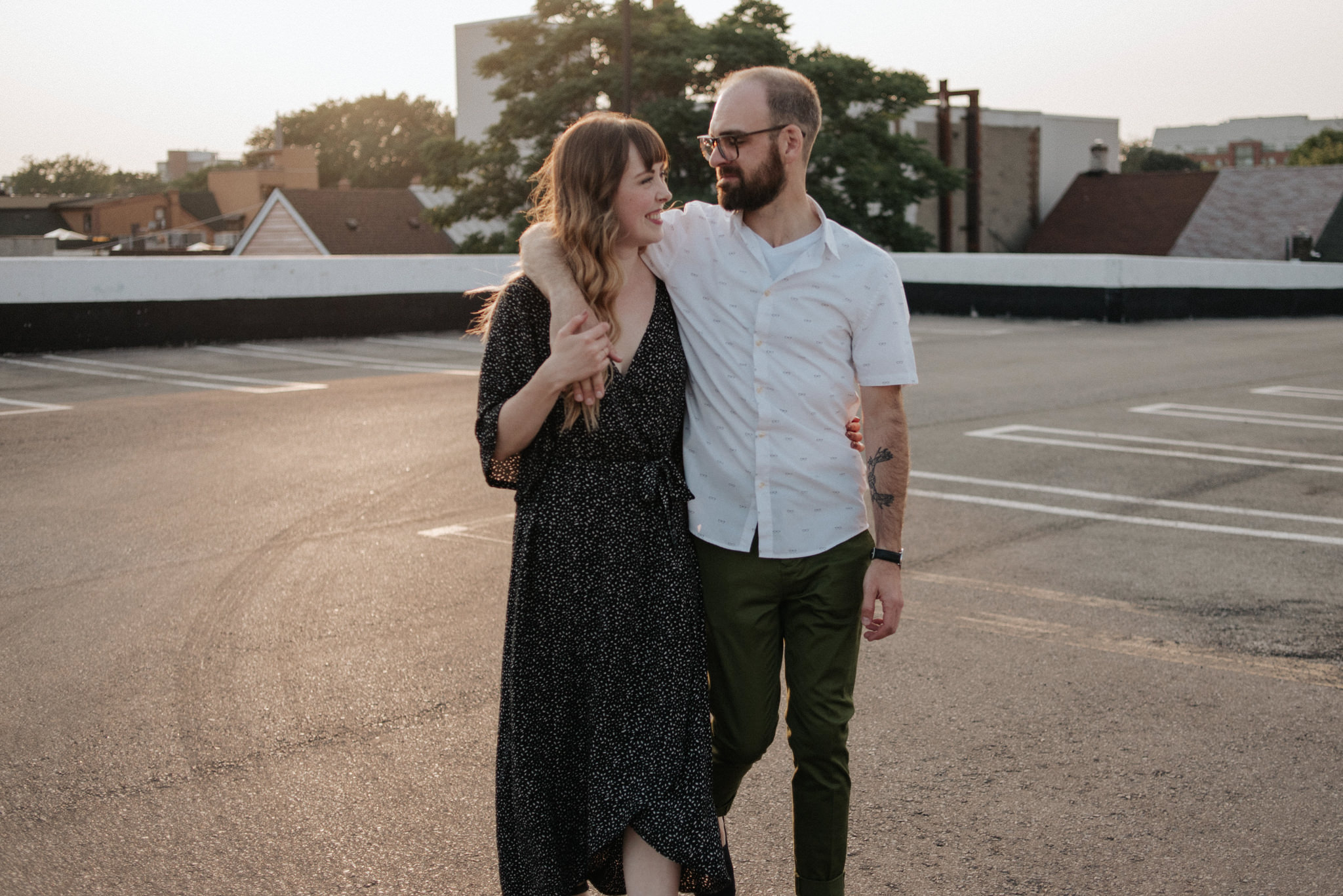 Couple on rooftop in Toronto at sunset