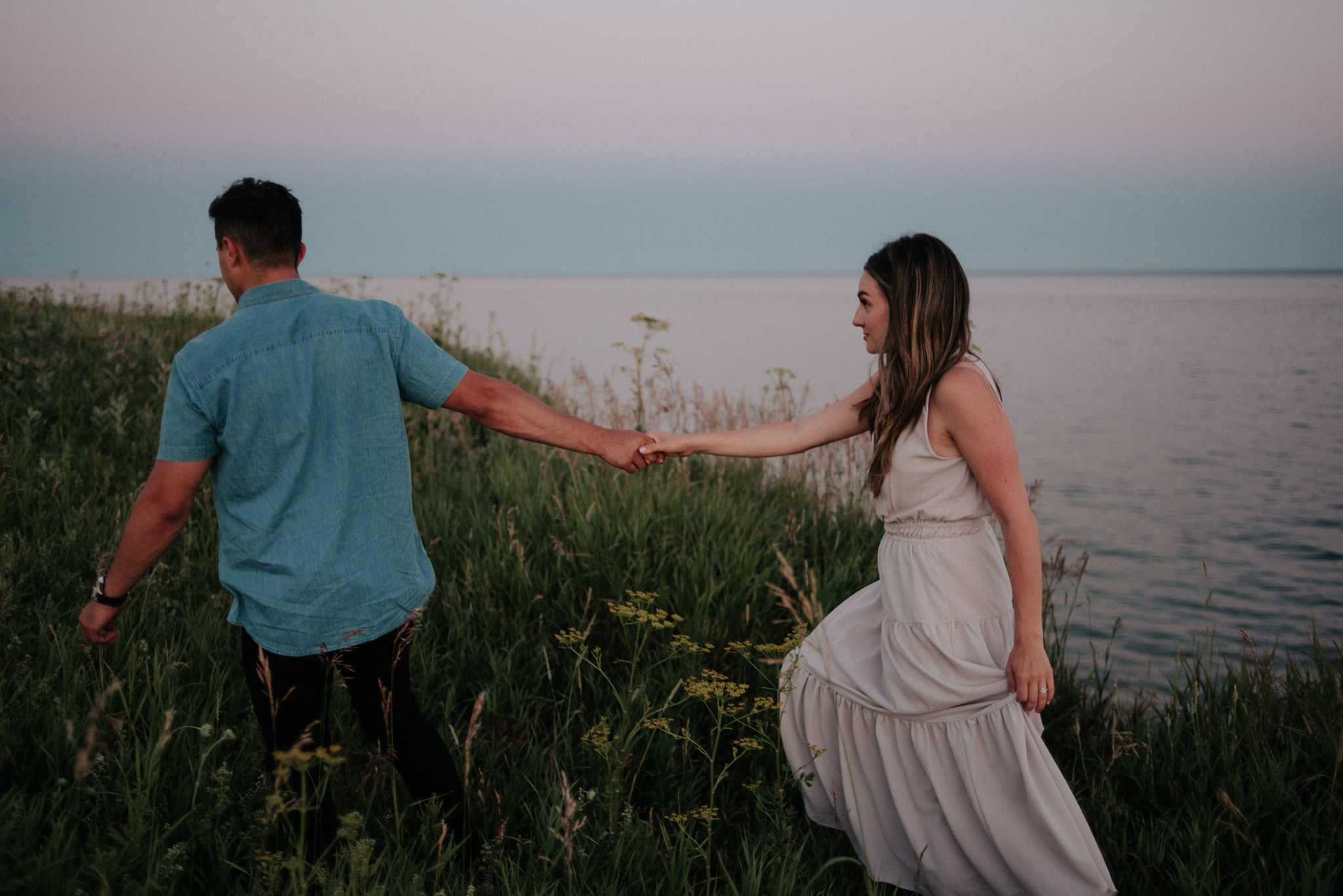 fun Lake Ontario sunset engagement shoot