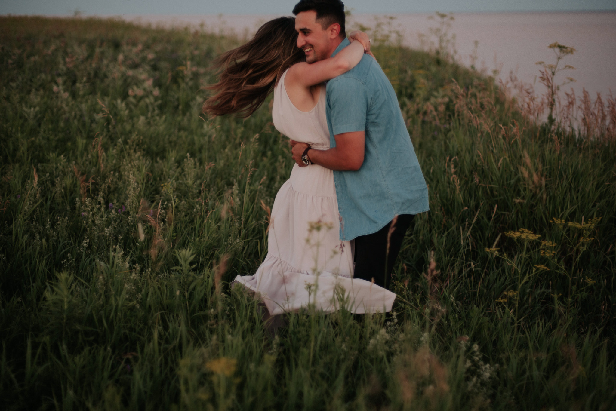 fun Lake Ontario sunset engagement shoot