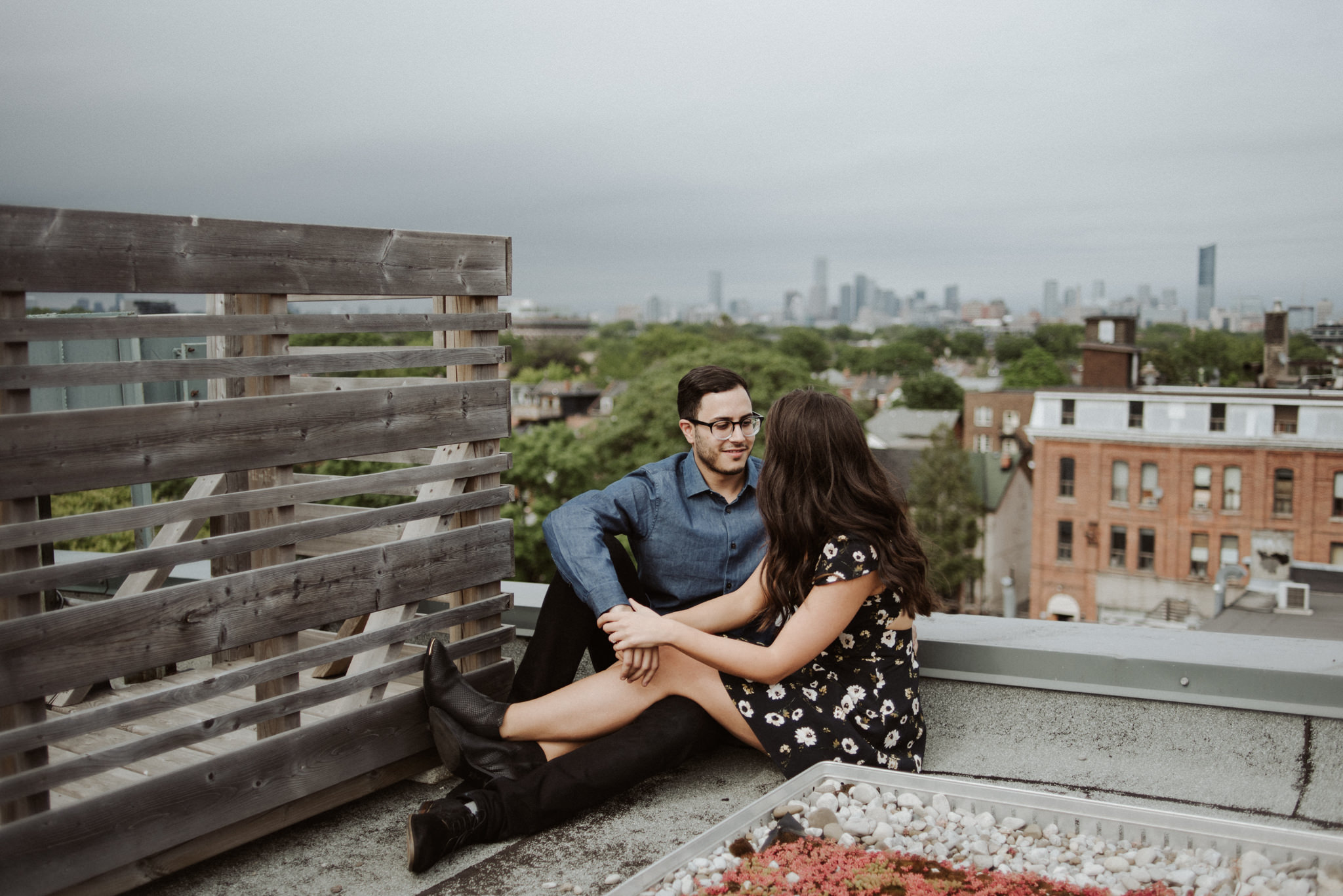 couple sitting on a rooftop