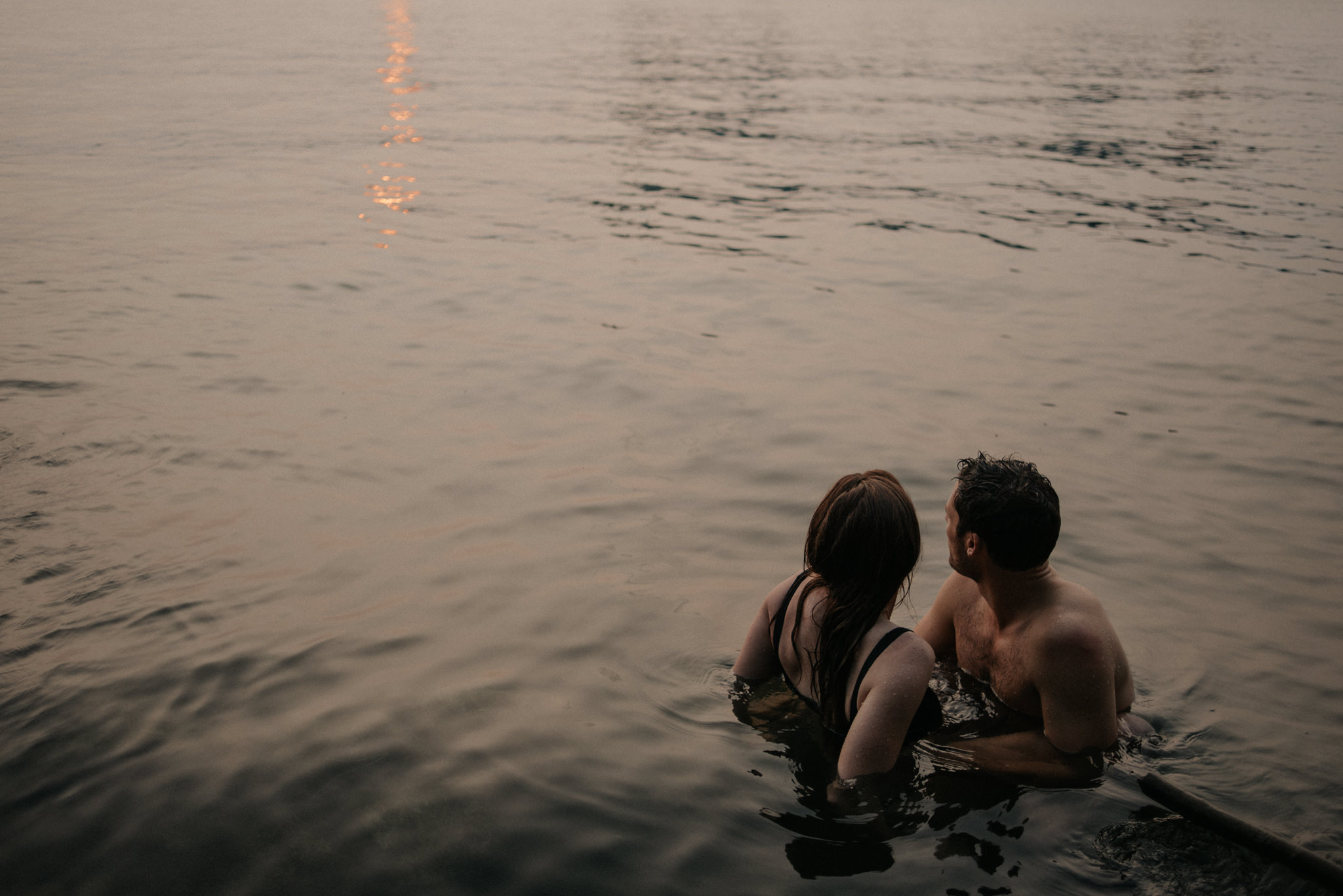 Couple in water overlooking Toronto