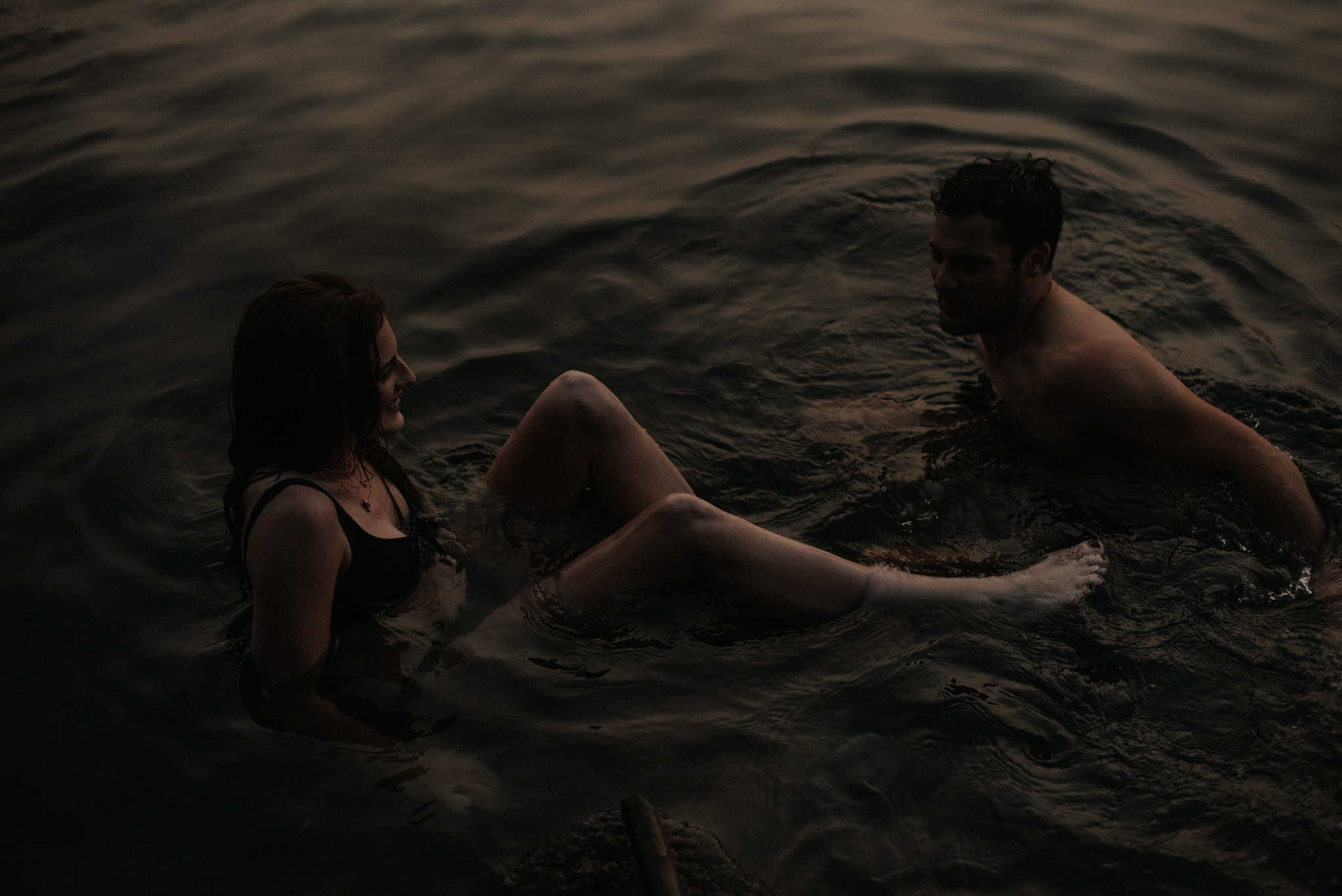 Couple in water overlooking Toronto