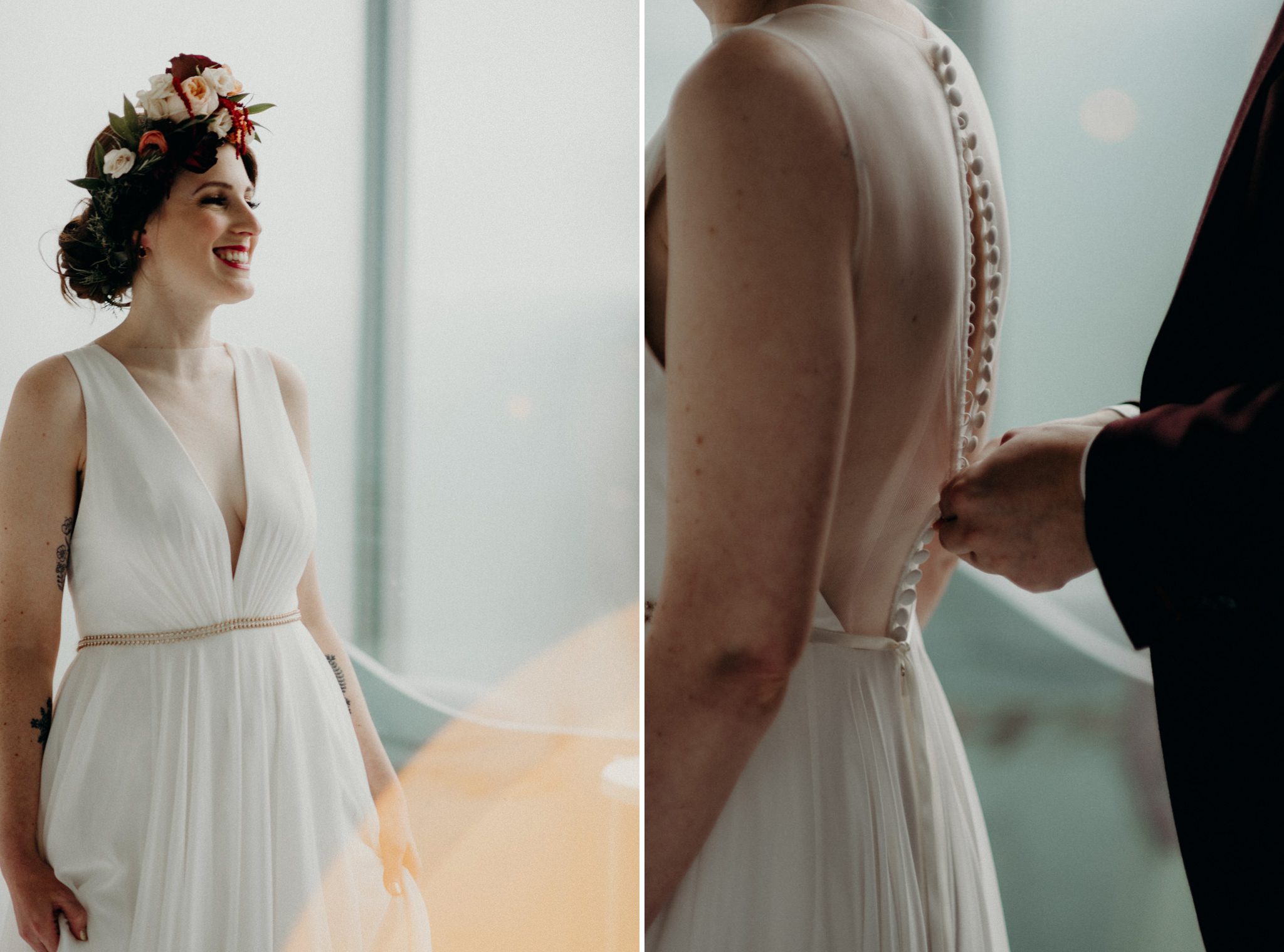 groom buttoning up back of brides dress in bedroom