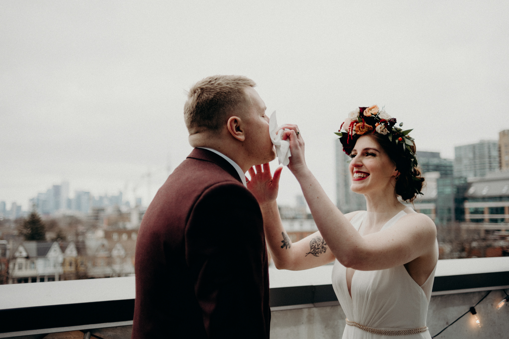 bride and groom outside on patio of condo