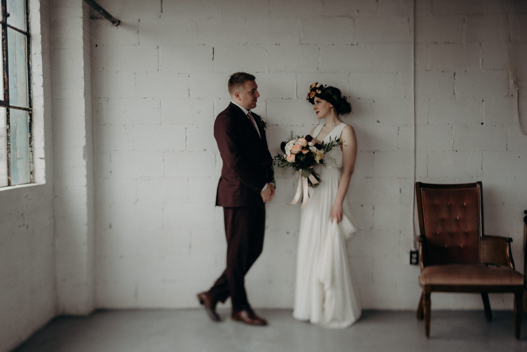 bride and groom holding hands