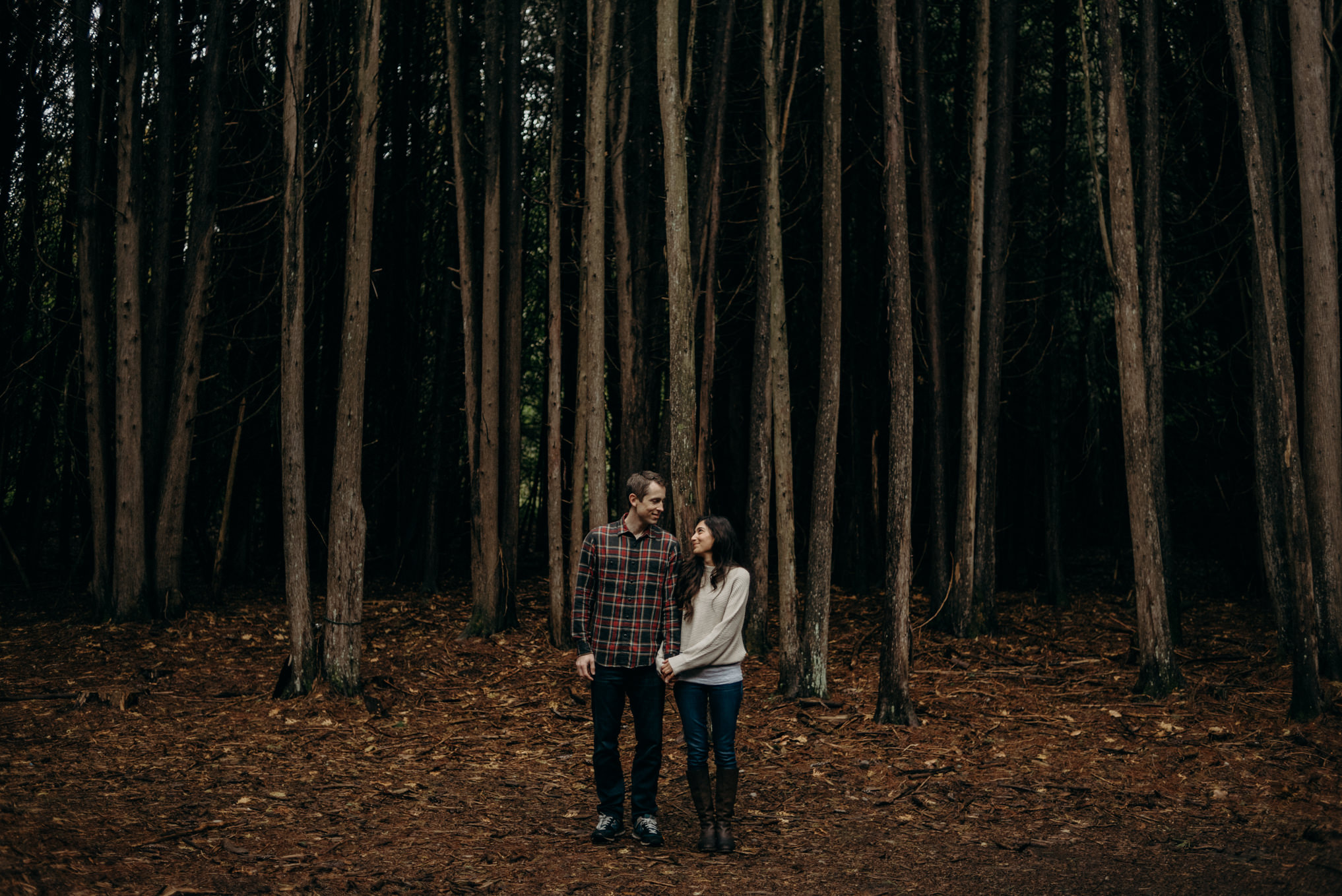 couple hugging in the forest, fall couple shoot