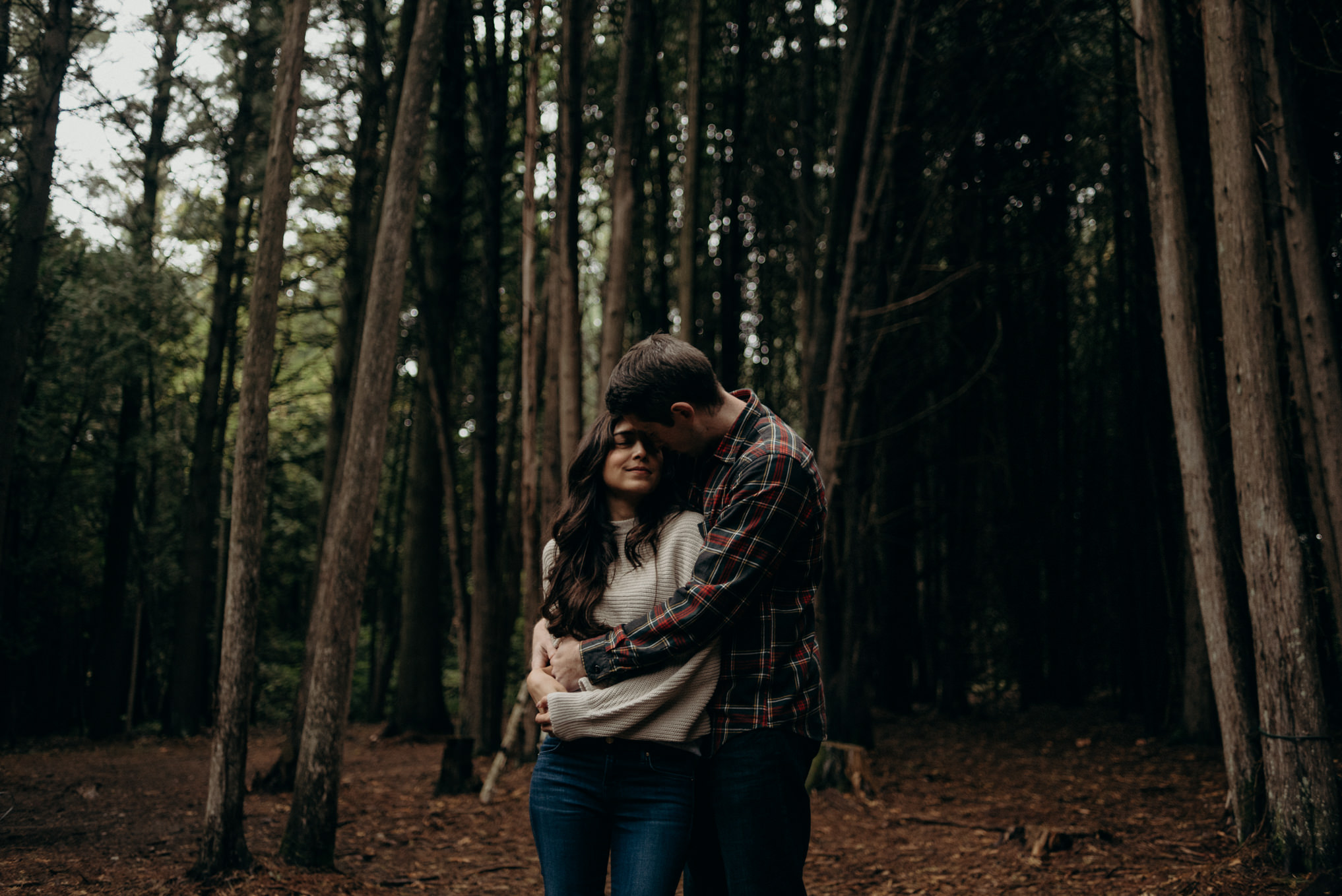 couple hugging in the forest, fall couple shoot