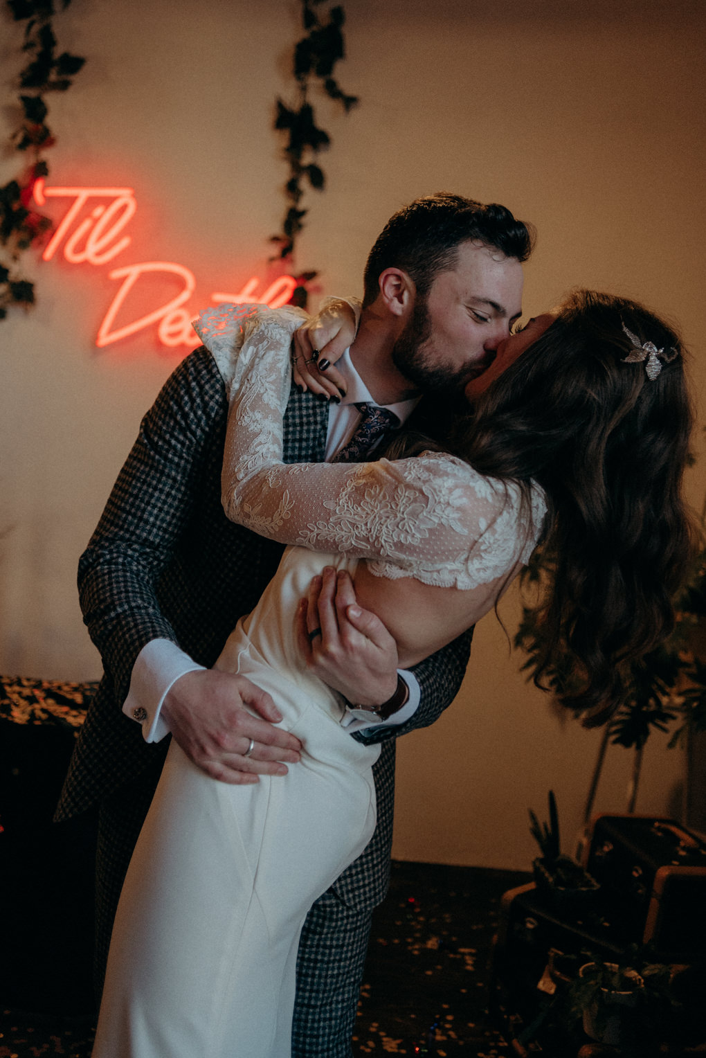 'til death neon wedding sign in old loft wedding