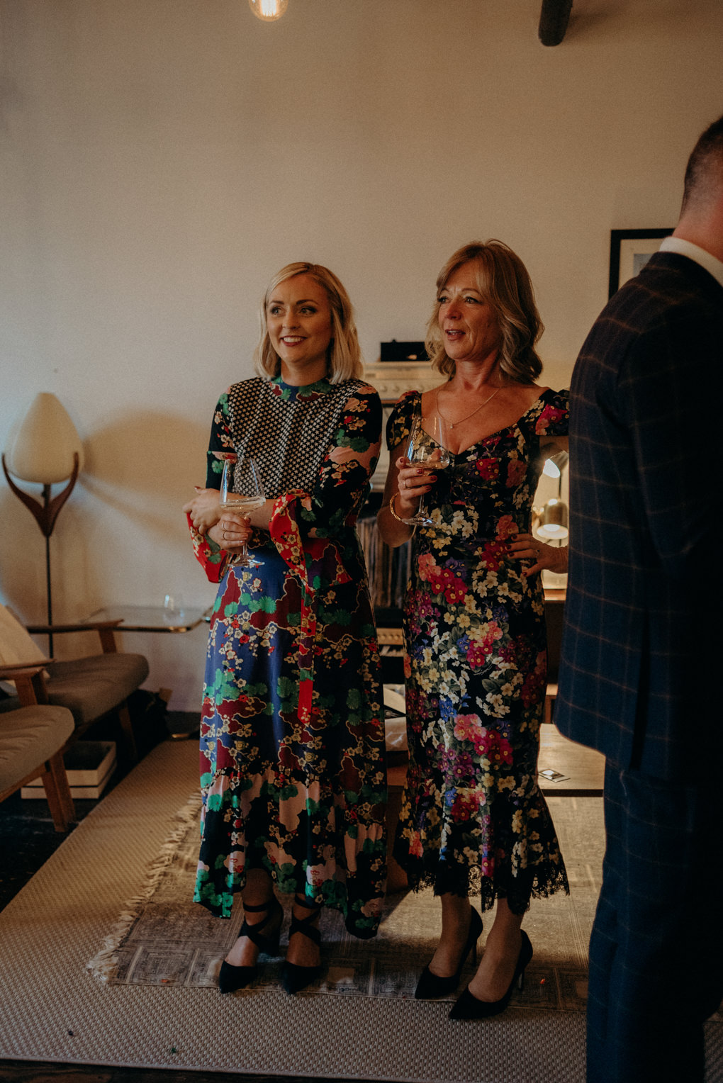 guests during cocktail hour in loft wedding reception