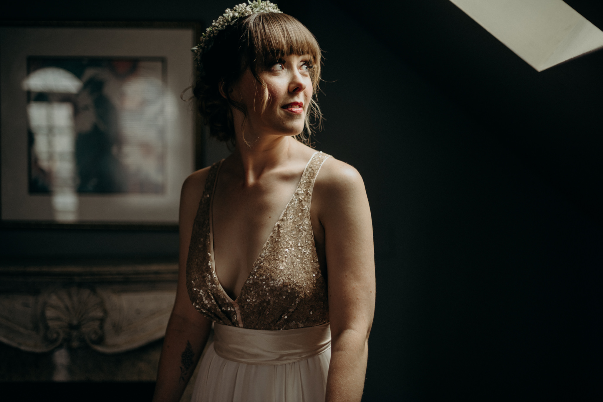 bride getting ready in room with skylight