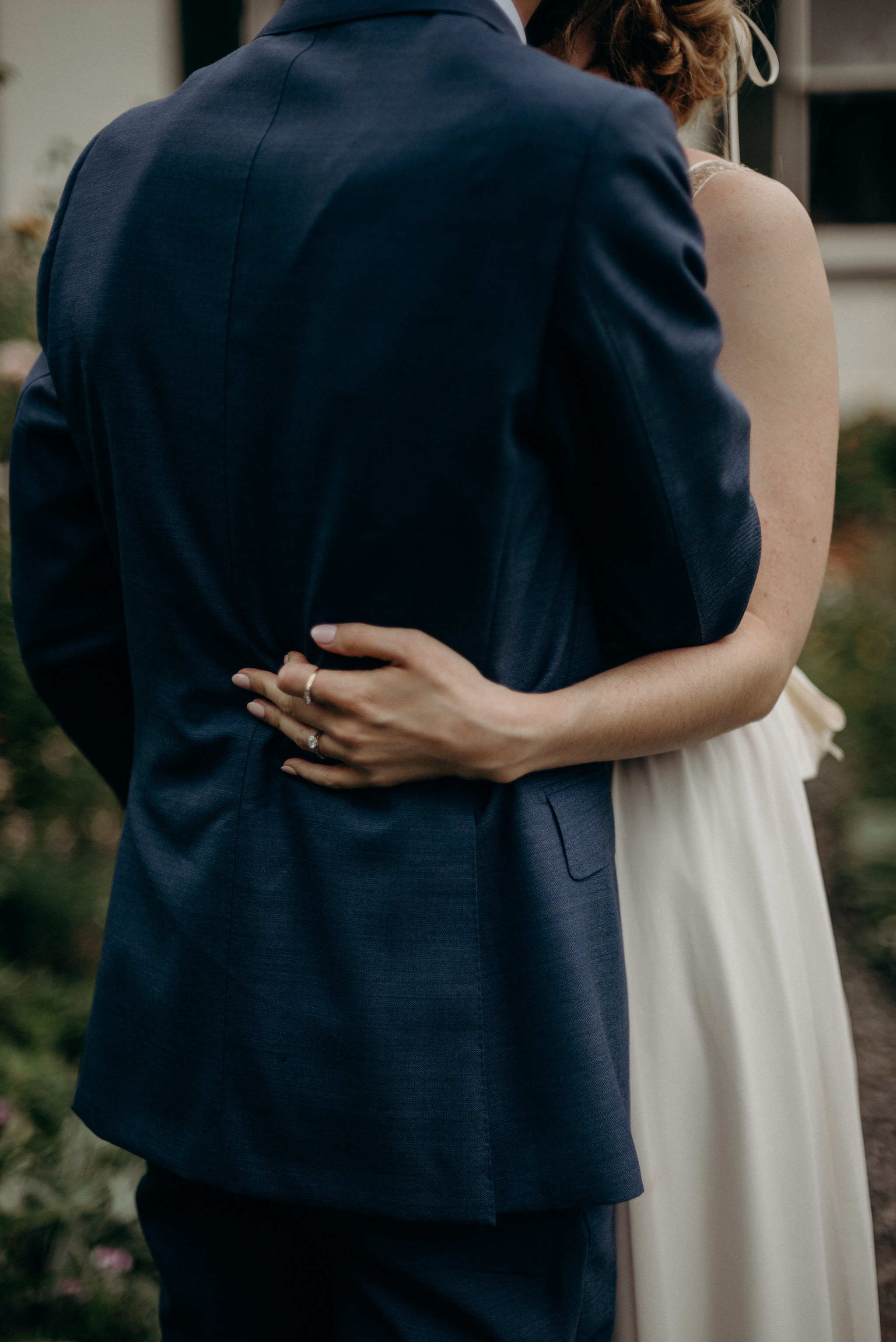 bride hugging groom