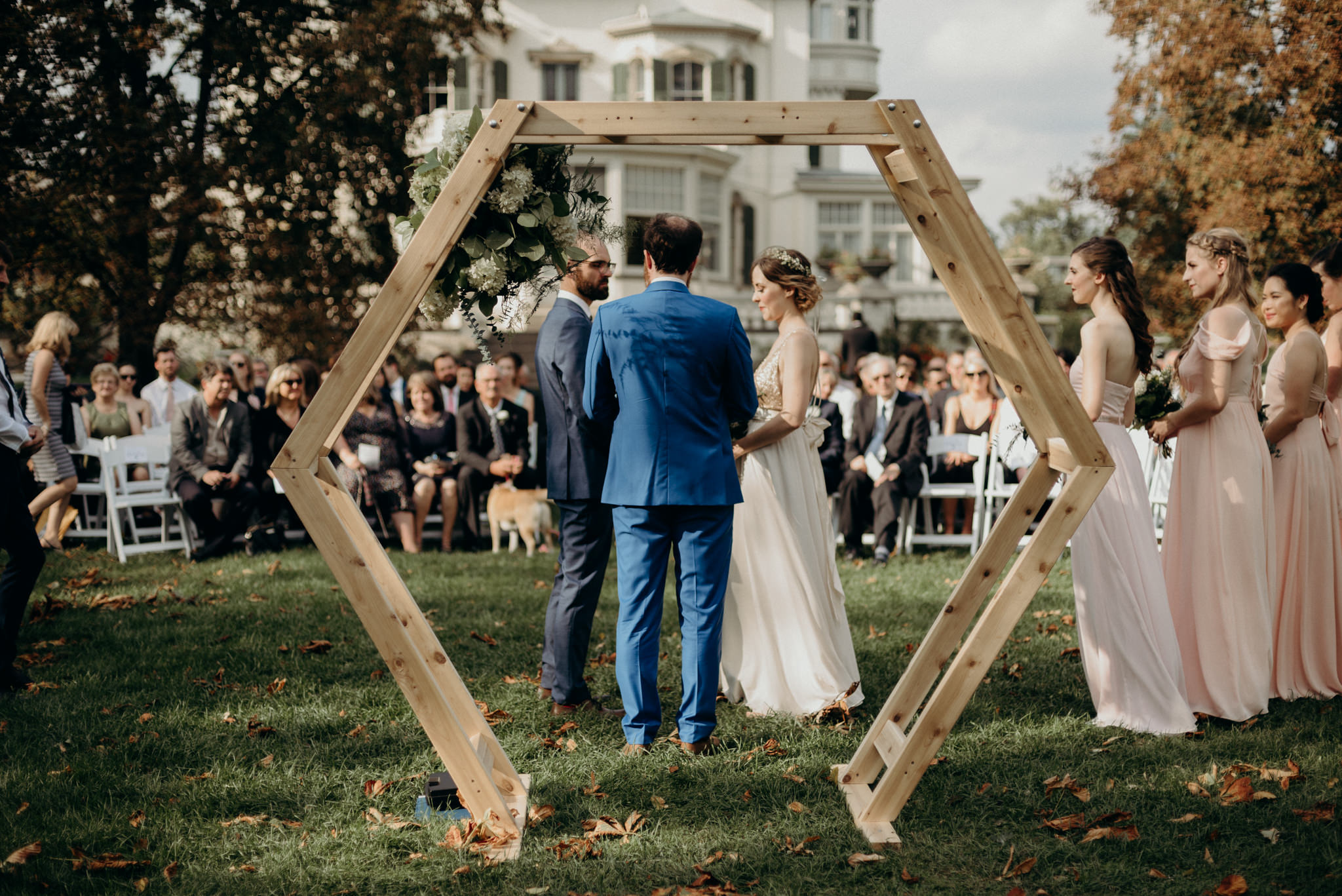 Wooden hexagon ceremony backdrop for outdoor wedding ceremony